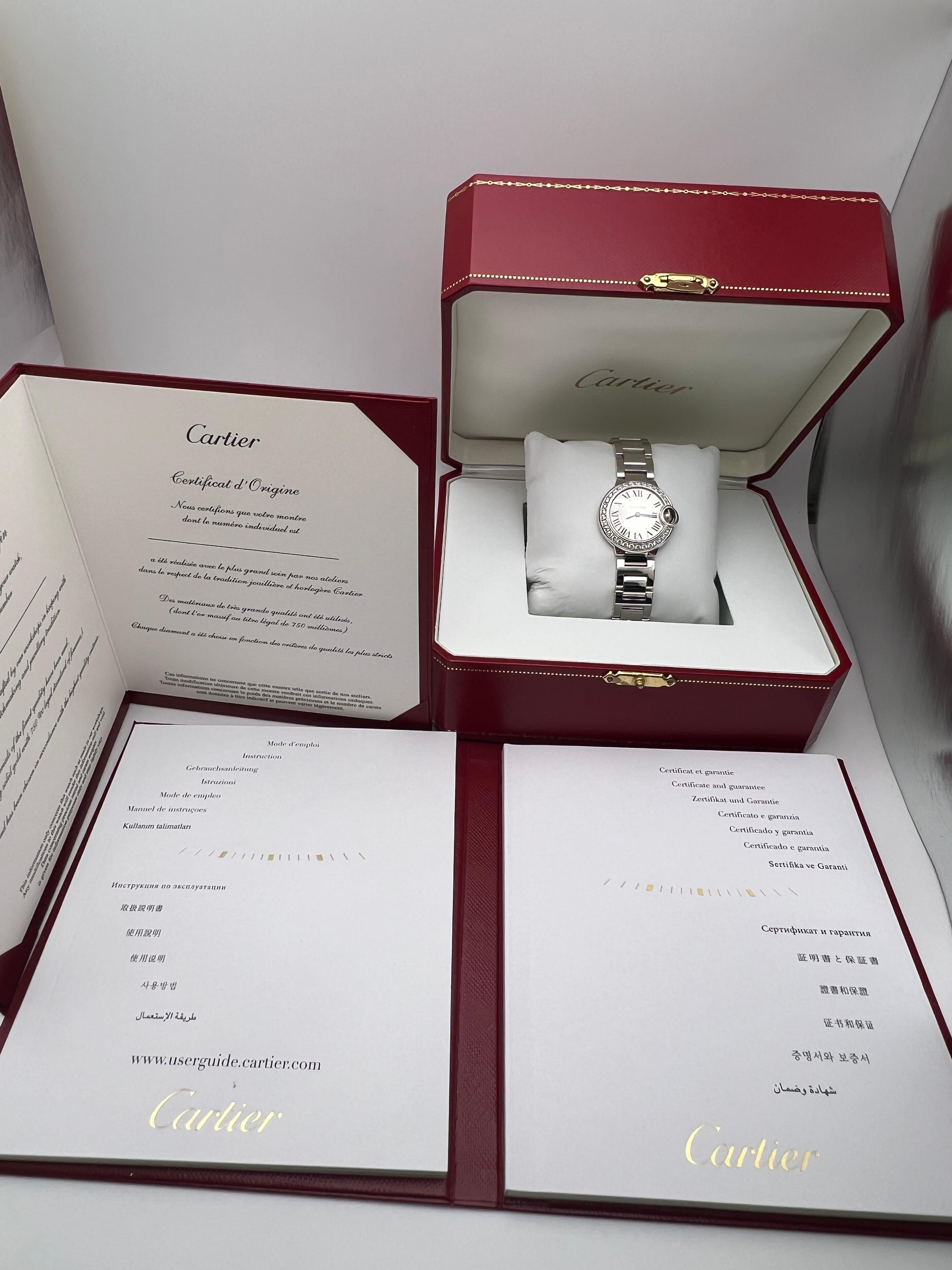 Cartier Ballon Bleu WE9003Z3 features a 28mm solid 18K white gold case, adorned with a stunning factory-set diamond bezel that enhances its luxurious and sophisticated design. The silver dial is complemented by Roman numerals and blued steel