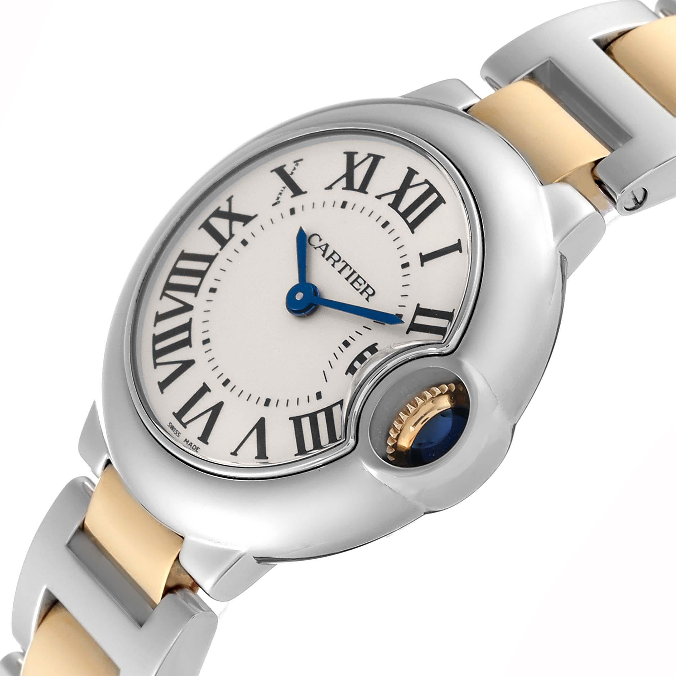 Cartier Ballon Bleu 28mm Steel Yellow Gold Ladies Watch W69007Z3. Quartz movement. Round stainless steel case 28.0 mm in diameter. Fluted 18k yellow gold crown set with a blue spinel cabochon. Stainless steel smooth bezel. Scratch resistant sapphire