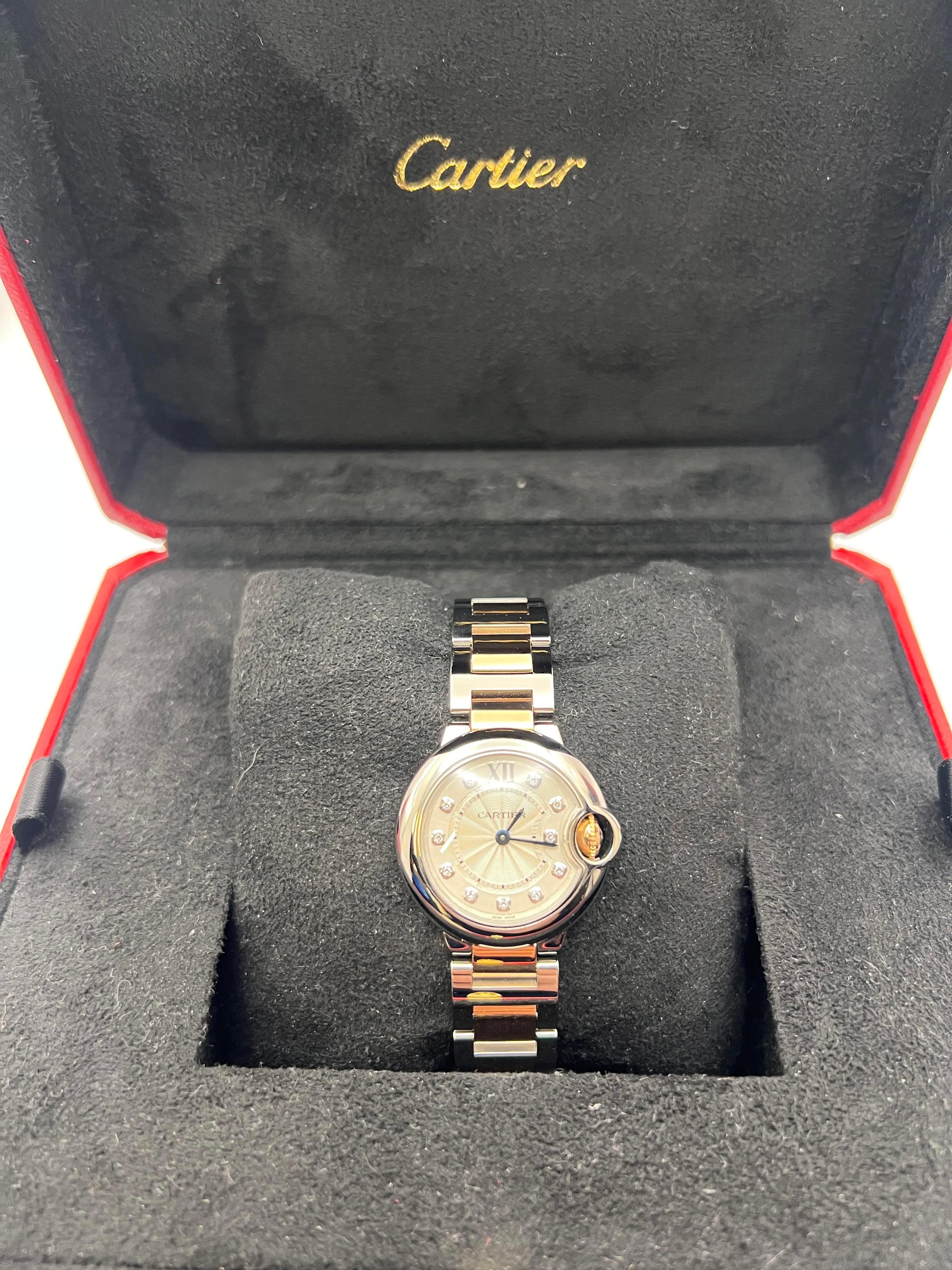 The Cartier Ballon Bleu de Cartier, reference WE902030, is a luxurious and elegant timepiece that embodies Cartier's signature blend of sophistication and innovation. This model features a 28mm 18K rose gold and stainless steel case with a polished