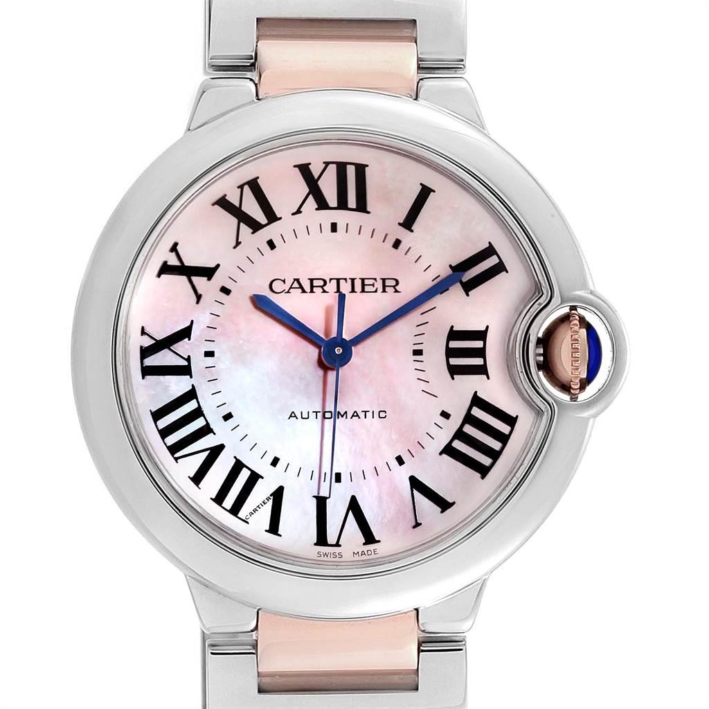 Cartier Ballon Bleu 36 Midsize Steel Rose Gold MOP Ladies Watch W6920070. Automatic self-winding movement. Round stainless steel case 36 mm in diameter. Fluted 18K rose gold crown set with the blue spinel cabochon. Stainless steel fixed smooth