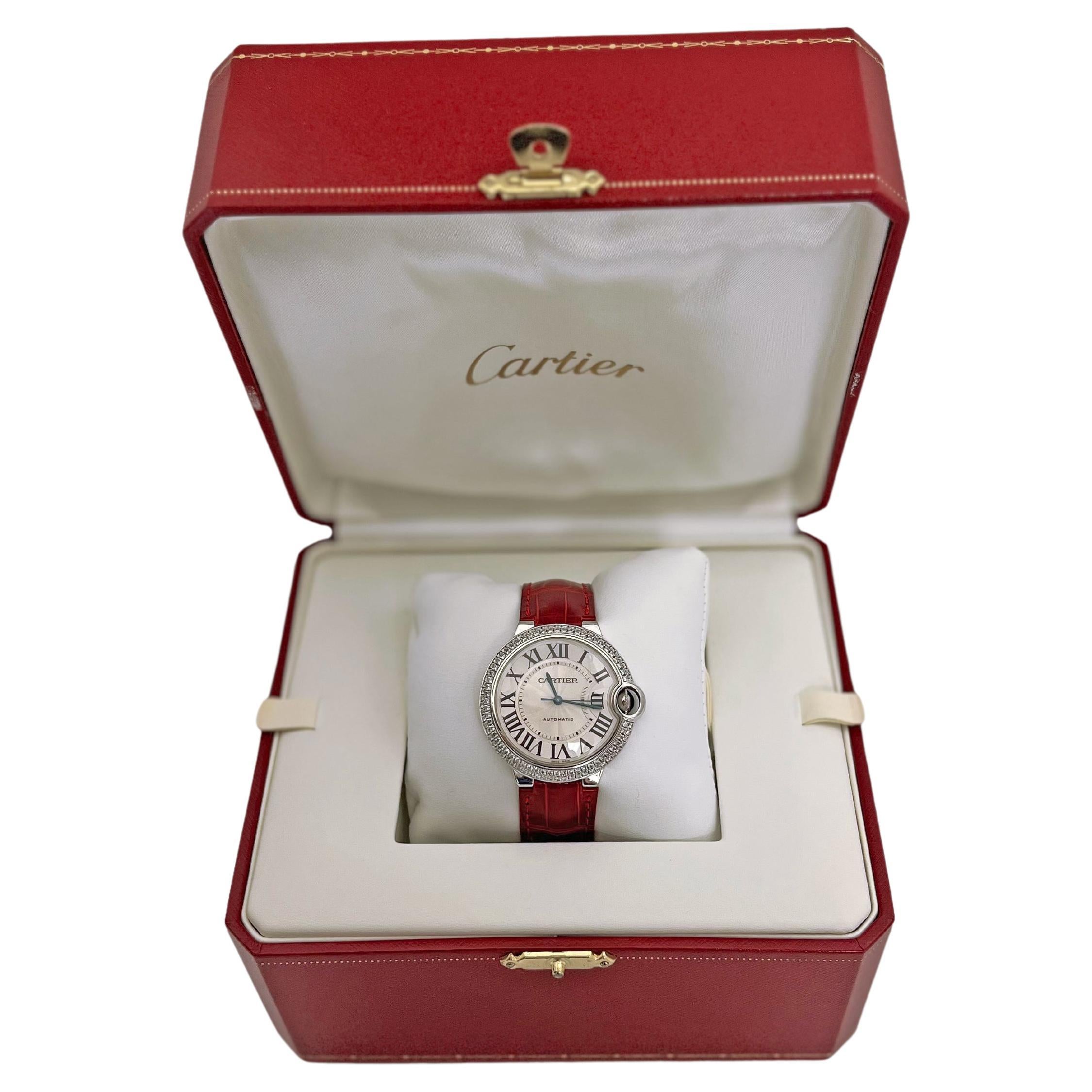 Pre-owned Cartier Ballon Bleu wristwatch (ref. WE900651), featuring a self-winding automatic movement; silvered opaline flinqué dial with black Roman numerals & blued-steel, sword-shaped hands; center seconds hand; and 36mm, 18k white gold case with