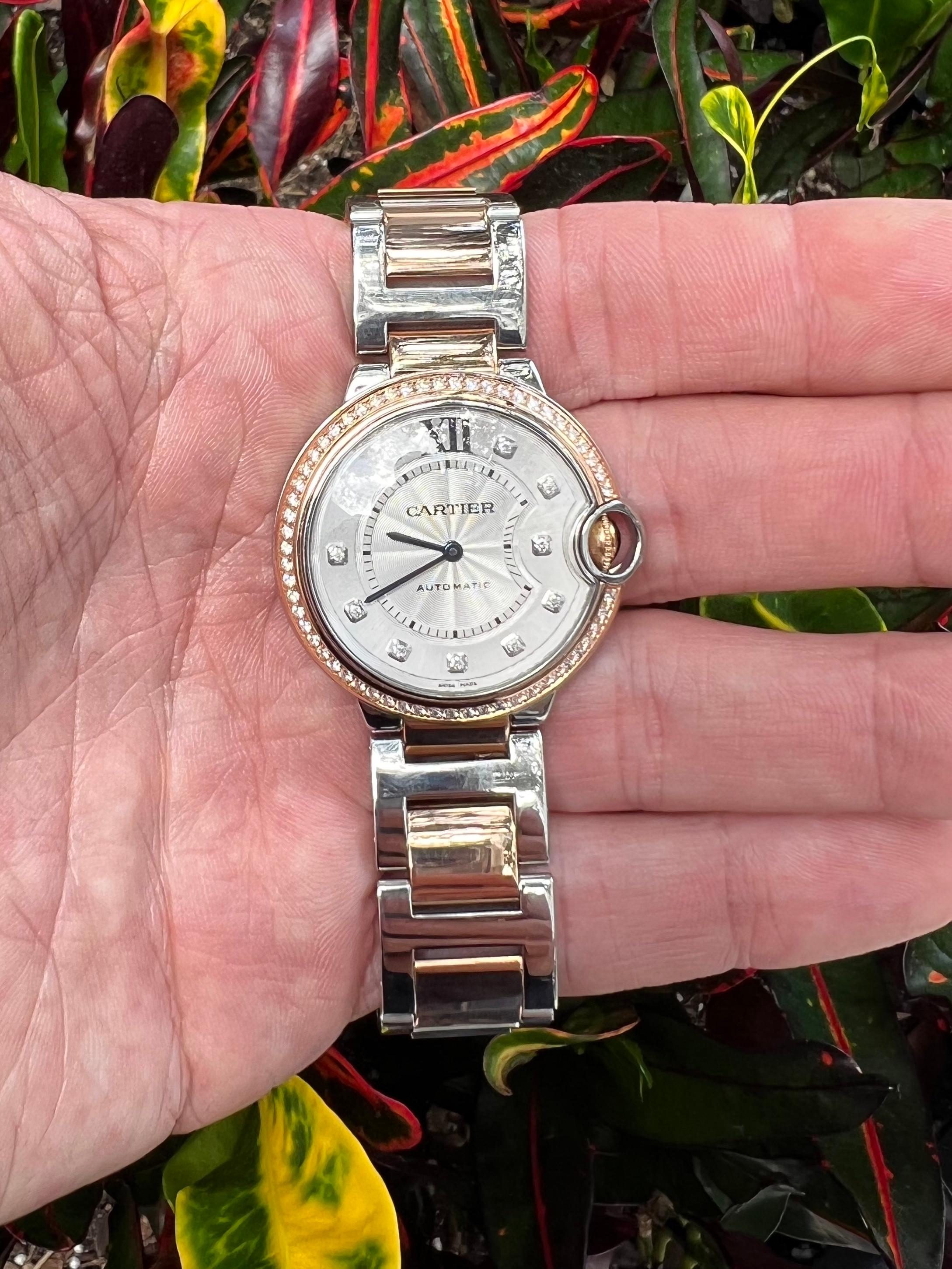 Beautiful Cartier Ballon Bleu wrist watch crafted in stainless steel and 18k rose gold. The watch is a 36 mm and set with factory round brilliant cut diamonds from Cartier. The watch has been fully serviced and polished by our in house jeweler. You