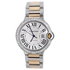 Cartier Montre unisexe Ballon en acier et or jaune 18 carats avec cadran argenté bicolore, 36 mm