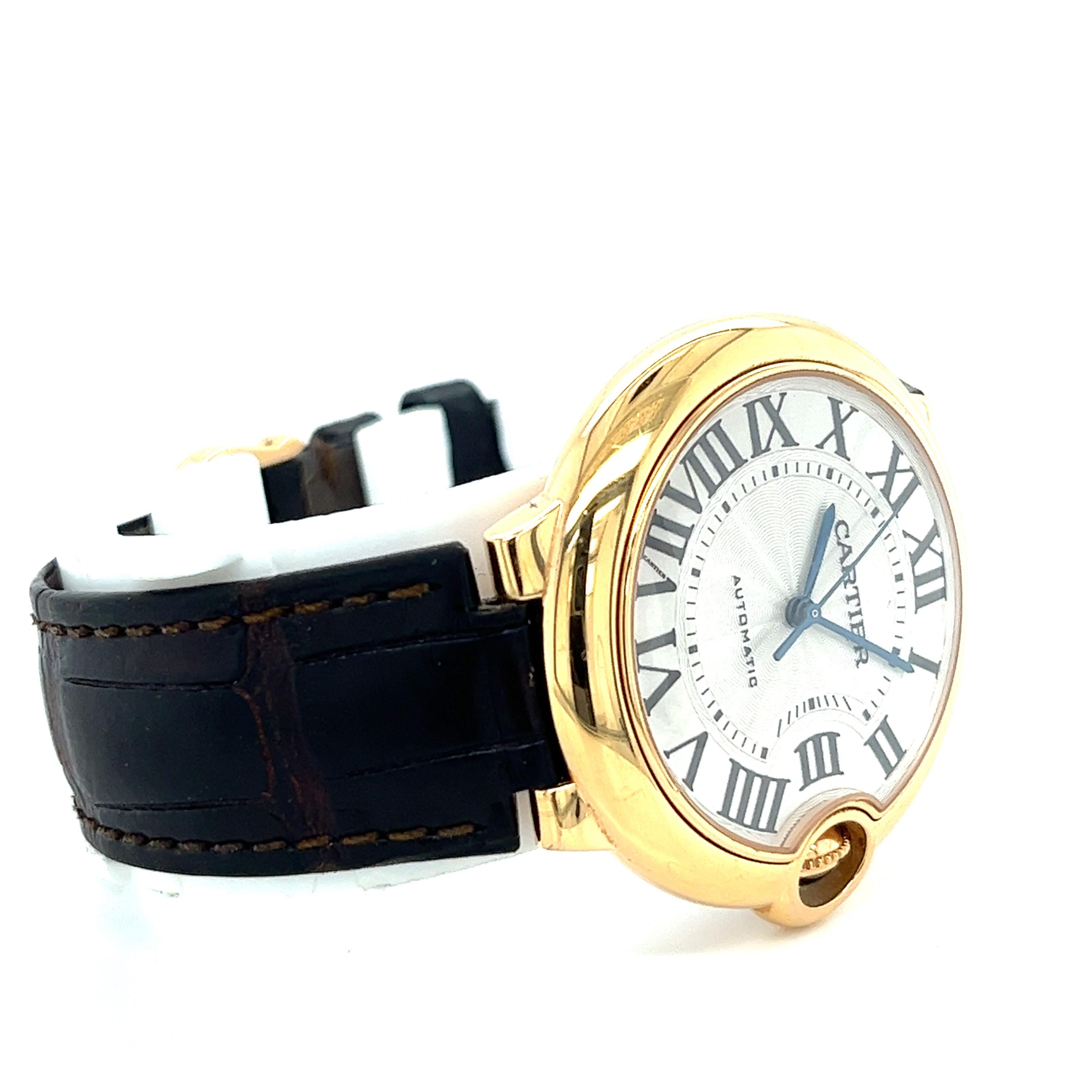 All original Cartier parts & movement. Comes with an additional Cartier leather strap. Cartier box, booklet, DVD, and certificate papers also included.

Pre-Owned Cartier Ballon Bleu reference 3003 wrist watch in 18-karat solid gold. 36mm round dial