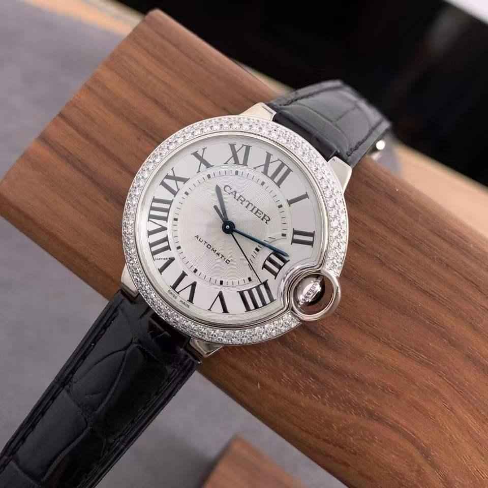 18kt white gold case with a pink alligator leather strap. Fixed 18kt white gold diamond-set bezel. Silvered opaline dial with blued-steel sword-shaped hands and black Roman numeral hour markers. Minute markers around the inner ring. Dial Type:
