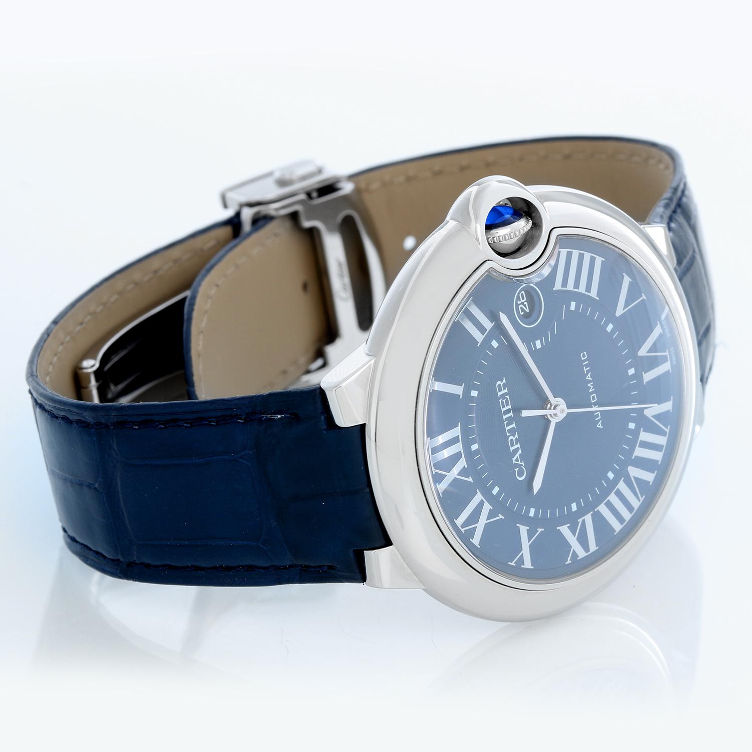 Cartier Ballon Bleu Men's 42mm Stainless Steel Automatic Blue Dial Watch WSBB0027 - Automatic winding. Stainless Steel (42mm diameter). Blue guilloche dial with Roman numerals; date at 3 o'clock. Blue strap with steel Cartier deployant clasp. Unused