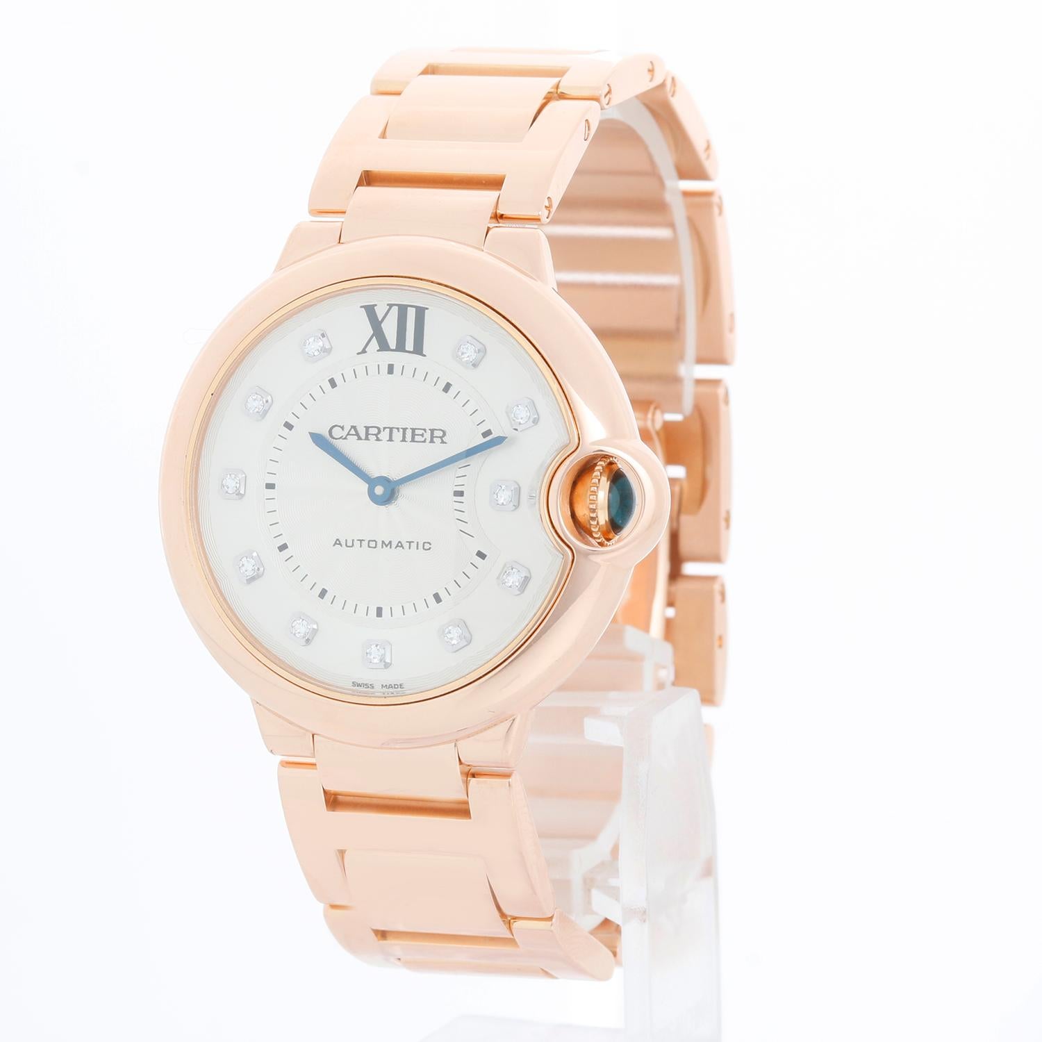 Cartier Ballon Bleu Midsize 18k Rose Gold Watch WE902026 3003 - Automatic winding. 18k rose gold case (36mm diameter). Silver guilloche dial with factory diamond hour markers. 18k rose gold Cartier bracelet with deployant clasp (will fit apx. 6-1/2