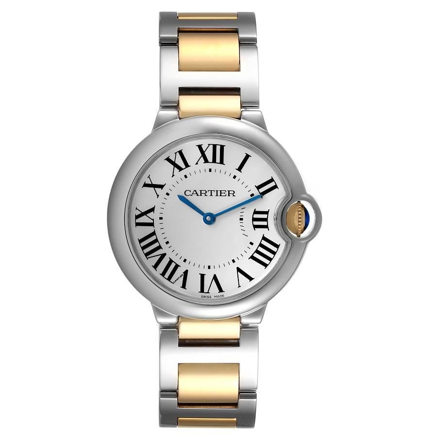 Cartier Ballon Bleu Midsize 36 Steel Yellow Gold Watch W69008Z3 Box Papers. Quartz movement. Round stainless steel and 18K yellow gold case 36.6 mm in diameter. Fluted crown set with the blue spinel cabochon. Stainless steel smooth bezel. Scratch
