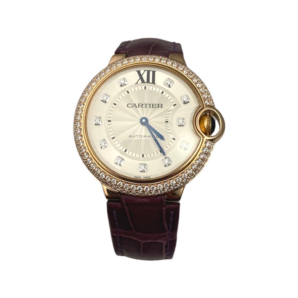 Brand: Cartier

Model Name: Ballon Bleu

Reference Number: W6900456

Movement: Automatic

Case Size: 36 mm

Case Back: Closed

Case Material: Rose Gold

Dial: Silver Diamond Dial

Bracelet: Purple Leather

Hour Markers: Diamonds

Includes: