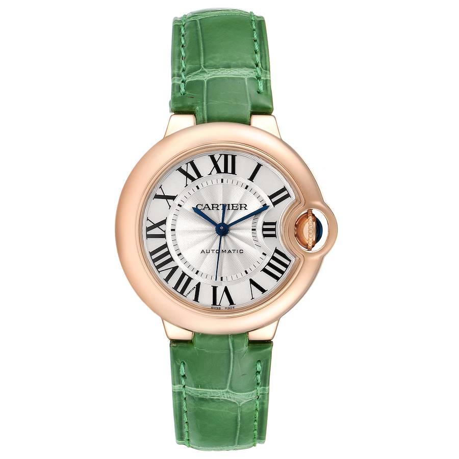 Cartier Ballon Bleu Rose Gold Silver Dial Ladies Watch W6920097 Box Papers. Automatic self-winding movement. 18K rose gold case 33 mm in diameter. Fluted crown set with the blue sapphire cabochon. 18K rose gold smooth bezel. Scratch resistant