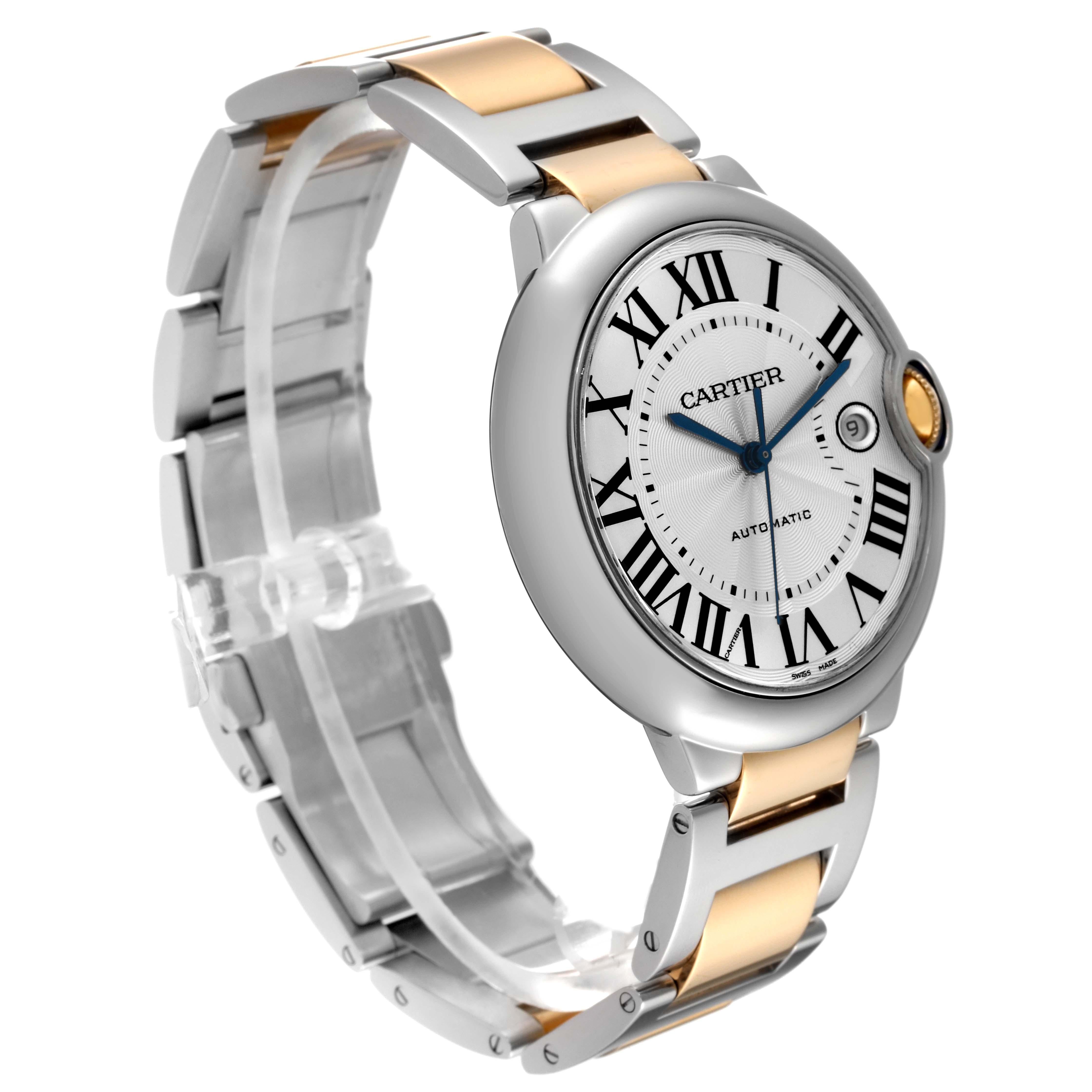 Cartier Ballon Bleu Silver Dial Steel Yellow Gold Mens Watch W69009Z3 Card. Automatic self-winding movement. Caliber 049. Round stainless steel case 42.1 mm in diameter, 13 mm thick. Fluted 18k yellow gold crown set with the blue spinel cabochon.