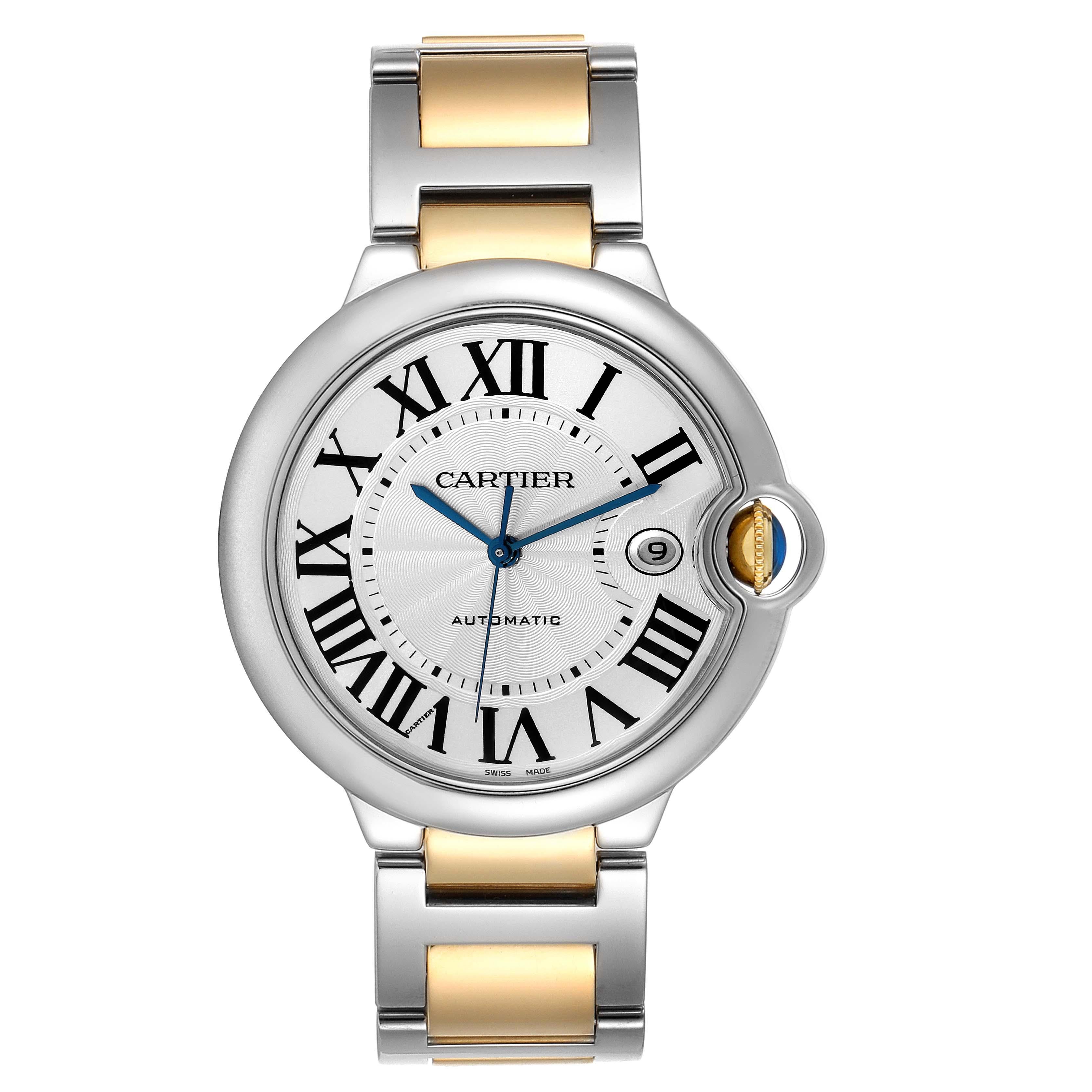 Cartier Ballon Bleu Silver Dial Steel Yellow Gold Mens Watch W69009Z3. Automatic self-winding movement. Round stainless steel case 42.1 mm in diameter, 13 mm thick. Fluted 18k crown set with the blue spinel cabochon. Stainless steel smooth bezel.
