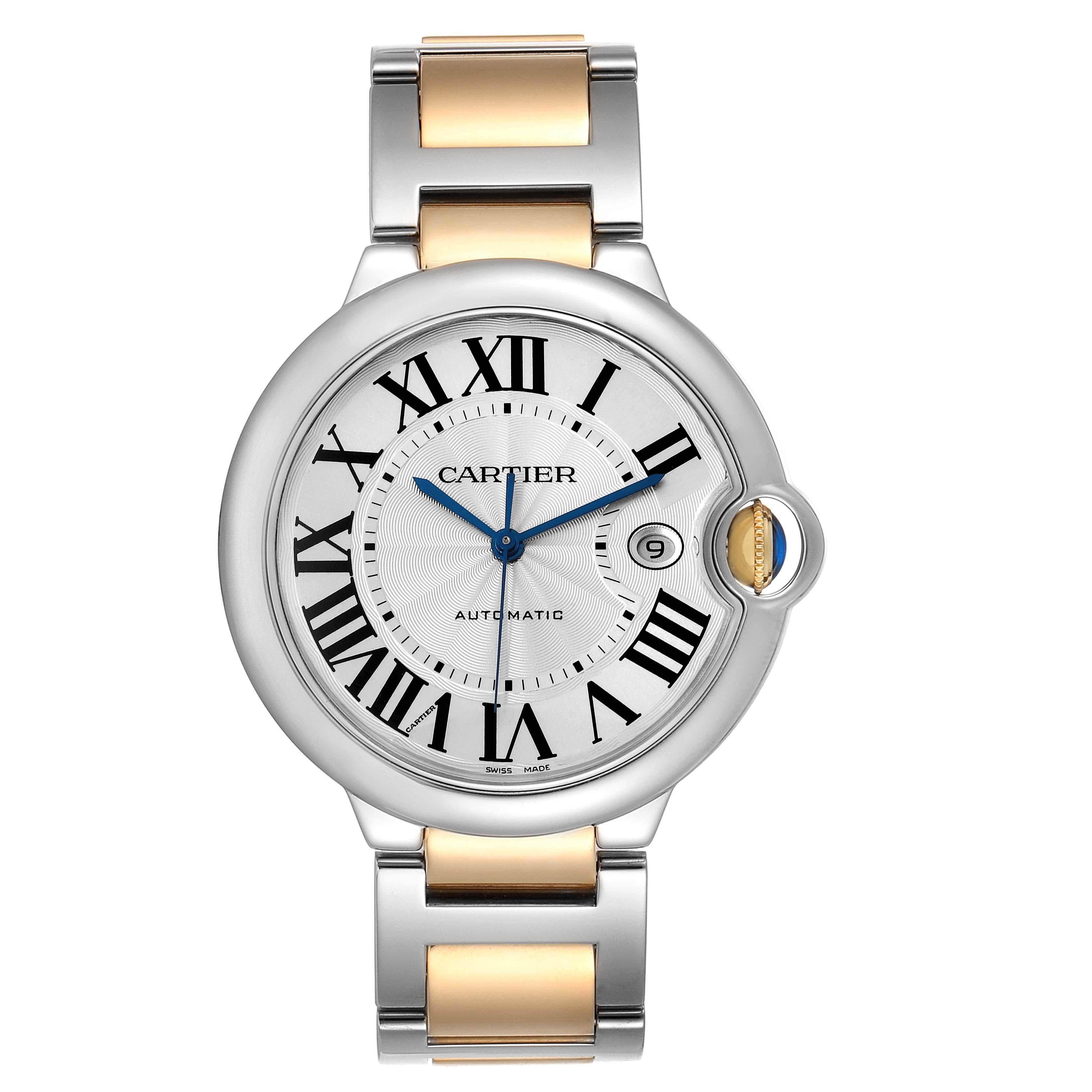Cartier Ballon Bleu Silver Dial Steel Yellow Gold Mens Watch W69009Z3. Automatic self-winding movement. Caliber 049. Round stainless steel case 42.1 mm in diameter, 13 mm thick. Fluted 18k yellow gold crown set with the blue spinel cabochon. .
