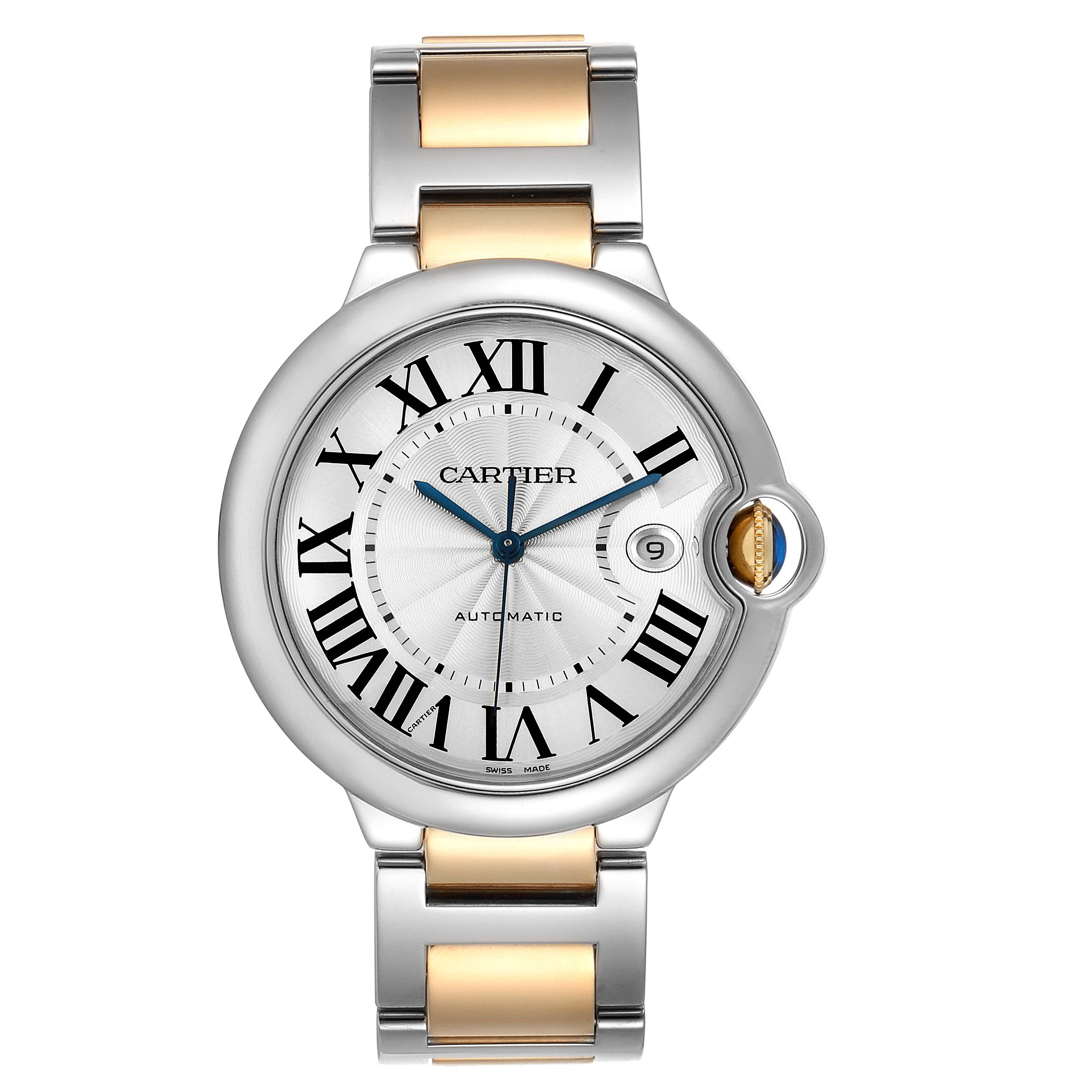Cartier Ballon Bleu Silver Dial Steel Yellow Gold Mens Watch W69009Z3. Automatic self-winding movement. Caliber 049. Round stainless steel case 42.1 mm in diameter, 13 mm thick. Fluted 18k crown set with the blue spinel cabochon. Stainless steel