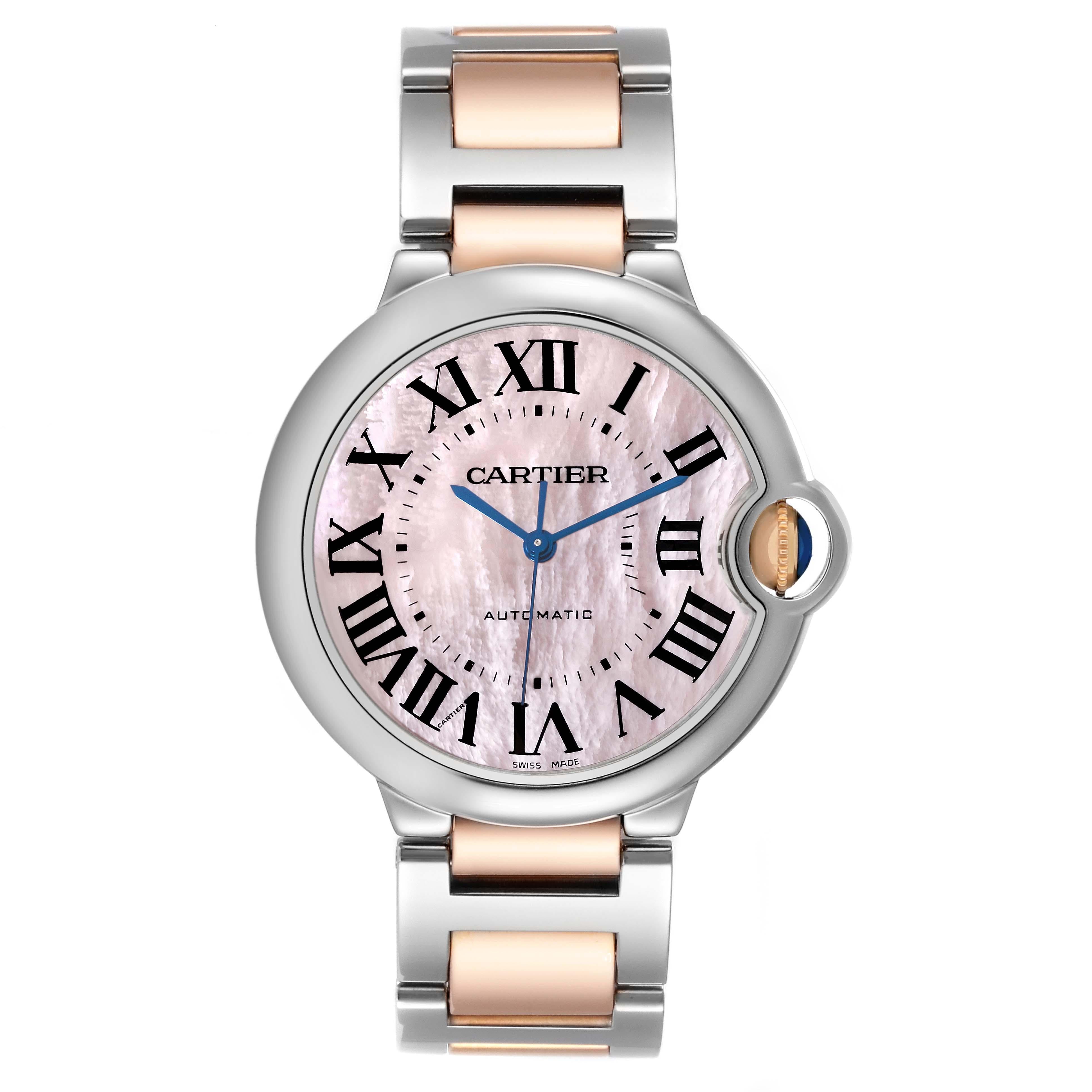 Cartier Ballon Bleu Steel Rose Gold Mother of Pearl Ladies Watch W6920033. Automatic self-winding movement. Round stainless steel case 36 mm in diameter. Fluted 18K rose gold crown set with a blue spinel cabochon. Stainless steel smooth bezel.