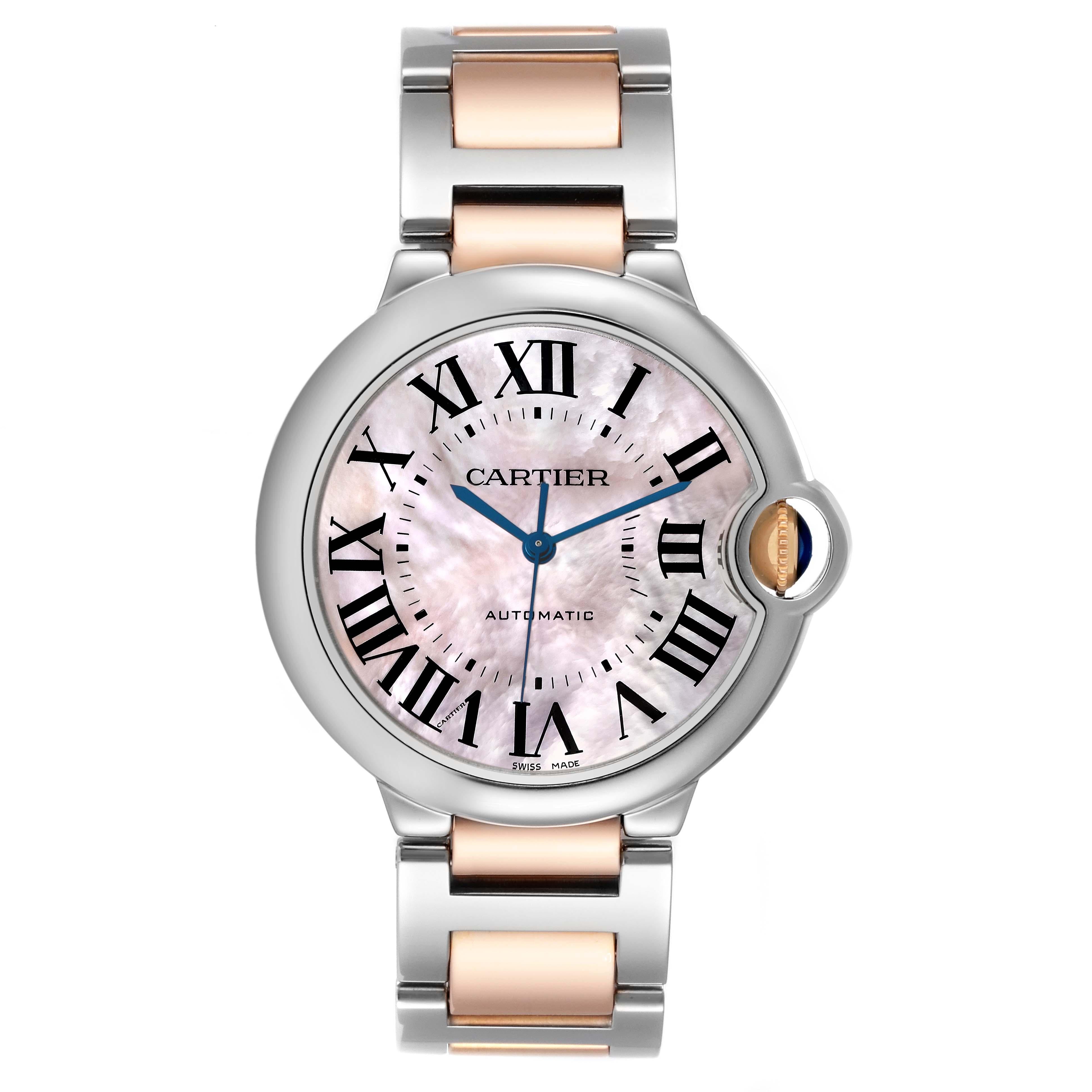 Cartier Ballon Bleu Steel Rose Gold Mother of Pearl Ladies Watch W6920033 Papers. Automatic self-winding movement. Round stainless steel case 36 mm in diameter. Fluted 18K rose gold crown set with a blue spinel cabochon. Stainless steel smooth