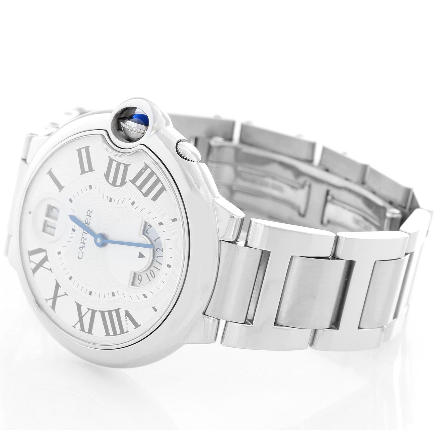Cartier Ballon Bleu Two Timezone Midsize Stainless Steel Watch W6920011 - Quartz. Stainless steel case. Silvered opaline dial with blue steel hands and Roman numeral hour markers. GMT sub-dial above the 6 o'clock position. Stainless steel Cartier