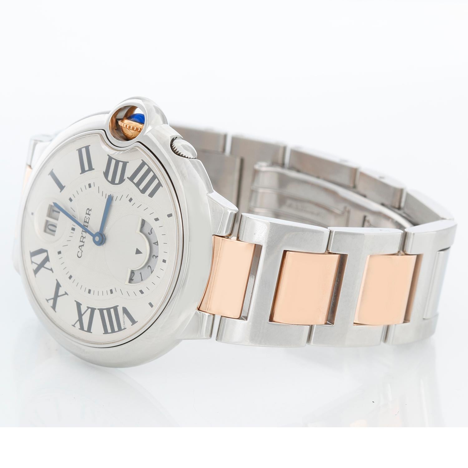 Cartier Ballon Bleu Two Timezone Rose Gold & Stainless Steel Watch W6920027 - Quartz. Stainless steel & Rose Gold case (38 mm ). Silvered opaline dial with blue steel hands and Roman numeral hour markers. GMT sub-dial above the 6 o'clock position.