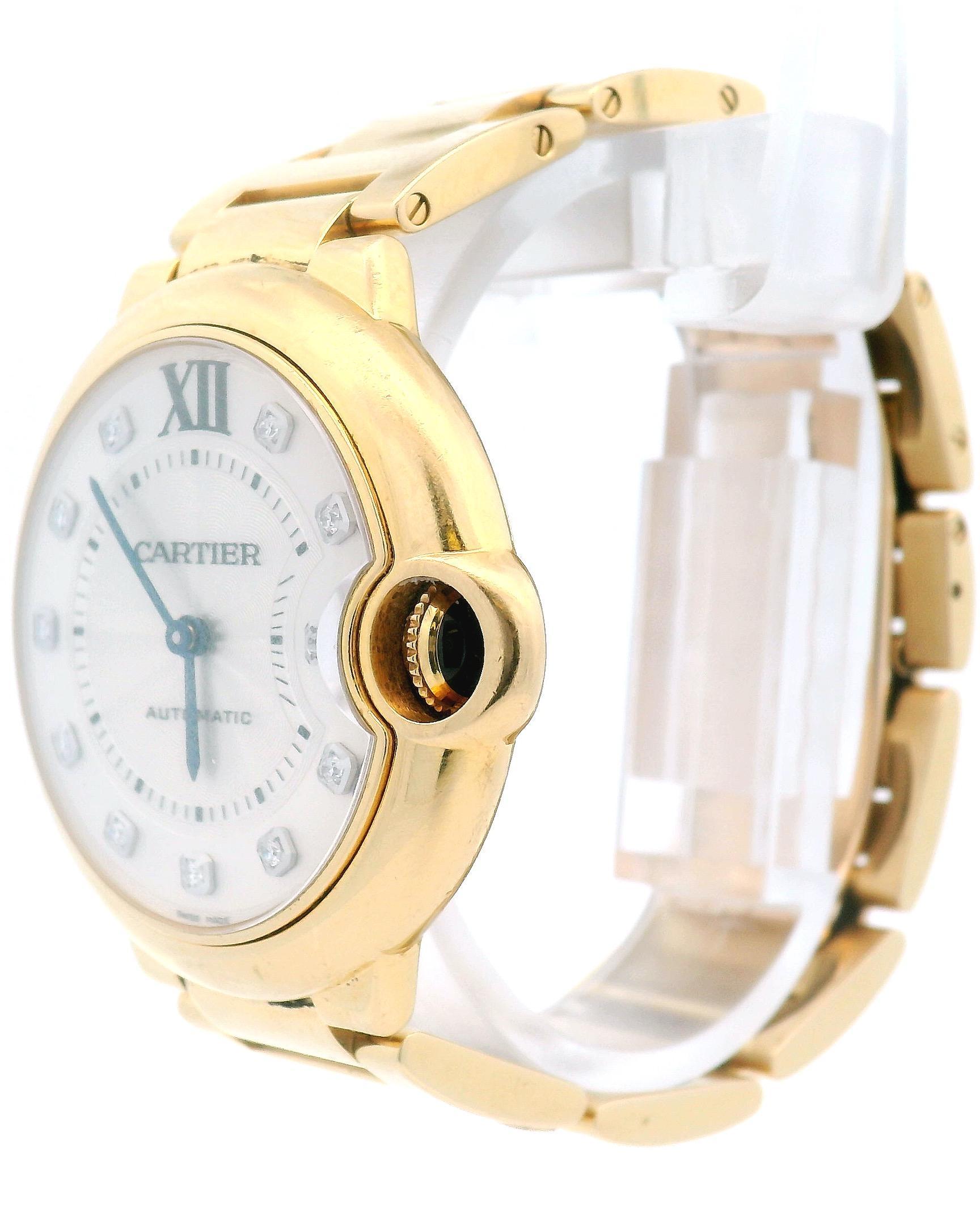 Cartier Ballon Bleu WE902027 / 3002 Mens Watch. 36mm 18K yellow gold case. 18K yellow gold bezel. Silver dial with blue steel hands and factory diamond hour markers. Minute markers on the inner dial. 18K yellow gold bracelet with hidden