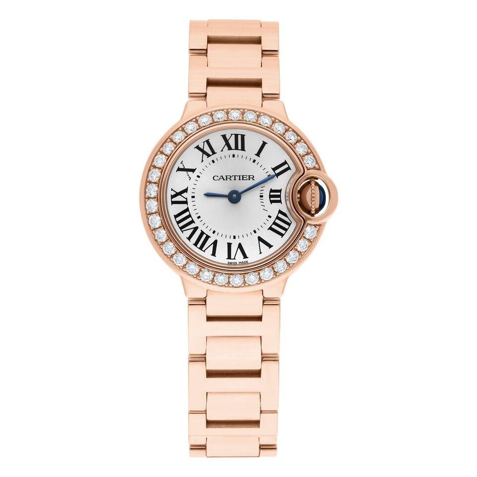 Introducing the captivating Cartier Ballon Bleu Rose Gold Diamond Ladies Watch WJBB0015, a masterpiece of timeless beauty and precise engineering.

Powered by a quartz movement, caliber 057, this watch boasts a round 18K rose gold case measuring
