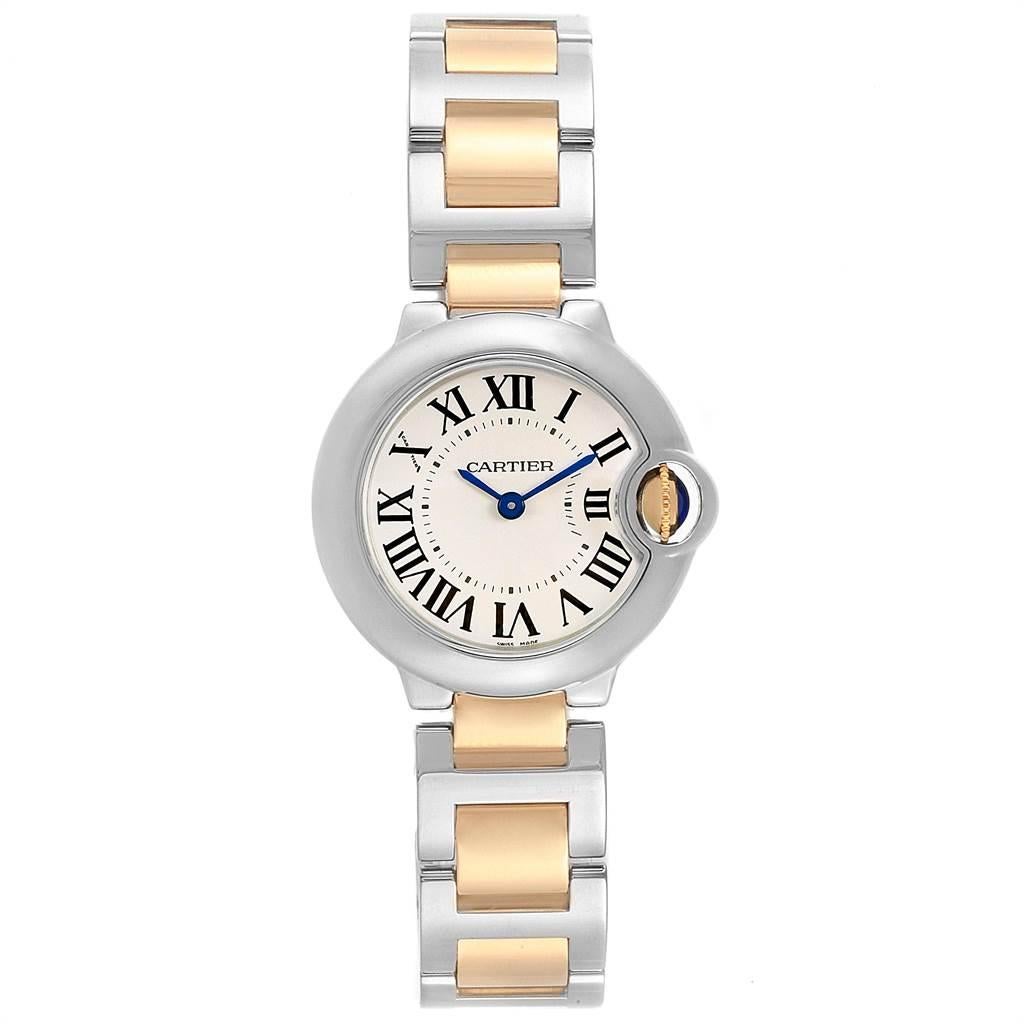 Cartier Ballon Blue 28mm Steel Yellow Gold Ladies Watch W69007Z3. Quartz movement. Round stainless steel case 29.0 mm in diameter. Fluted 18k crown set with the blue spinel cabochon. Fixed stainless steel smooth bezel. Scratch resistant sapphire