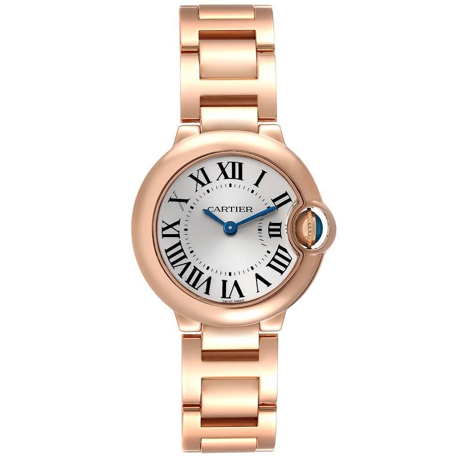 Cartier Ballon Blue 29 Silver Dial 18K Rose Gold Ladies Watch W69002Z2 Box Card. Quartz movement. Caliber 057. Round 18k rose gold case 29.0 mm in diameter. Fluted crown set with the blue spinel cabochon. 18k rose gold smooth bezel. Scratch