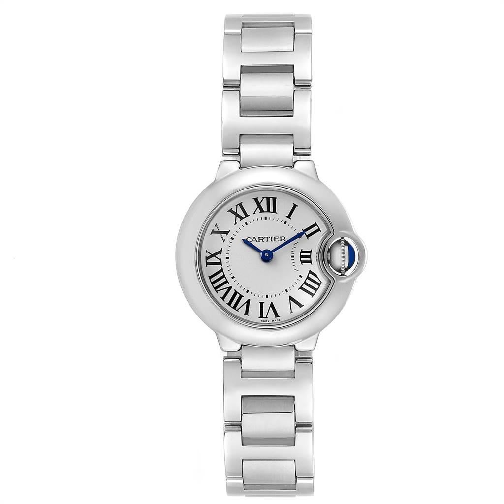 Cartier Ballon Blue 29 Silver Dial Quartz Ladies Watch W69010Z4. Quartz movement. Caliber 049. Round stainless steel case 29.0 mm in diameter. Fluted crown set with the blue spinel cabochon. Stainless steel smooth bezel. Scratch resistant sapphire