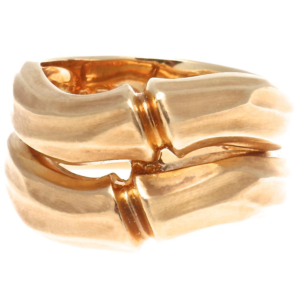 From the iconic Cartier bamboo collection. European size 53 or 6 1/4, with French eagle head hallmark and makers mark. In 18k gold.
