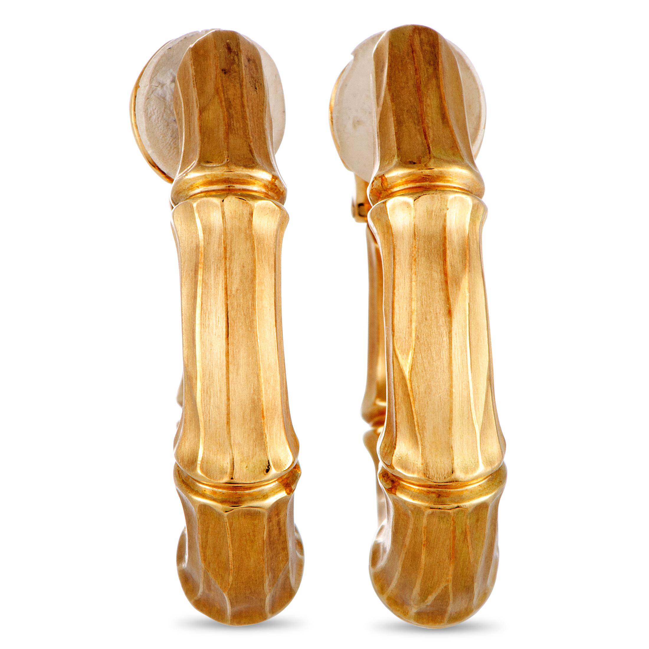 These Cartier earrings are crafted from 18K yellow gold and feature clip-on closure. Each of the two weighs 13.5 grams and they measure 1.37” in length and 0.25” in width.

The earrings are offered in estate condition and include the manufacturer’s