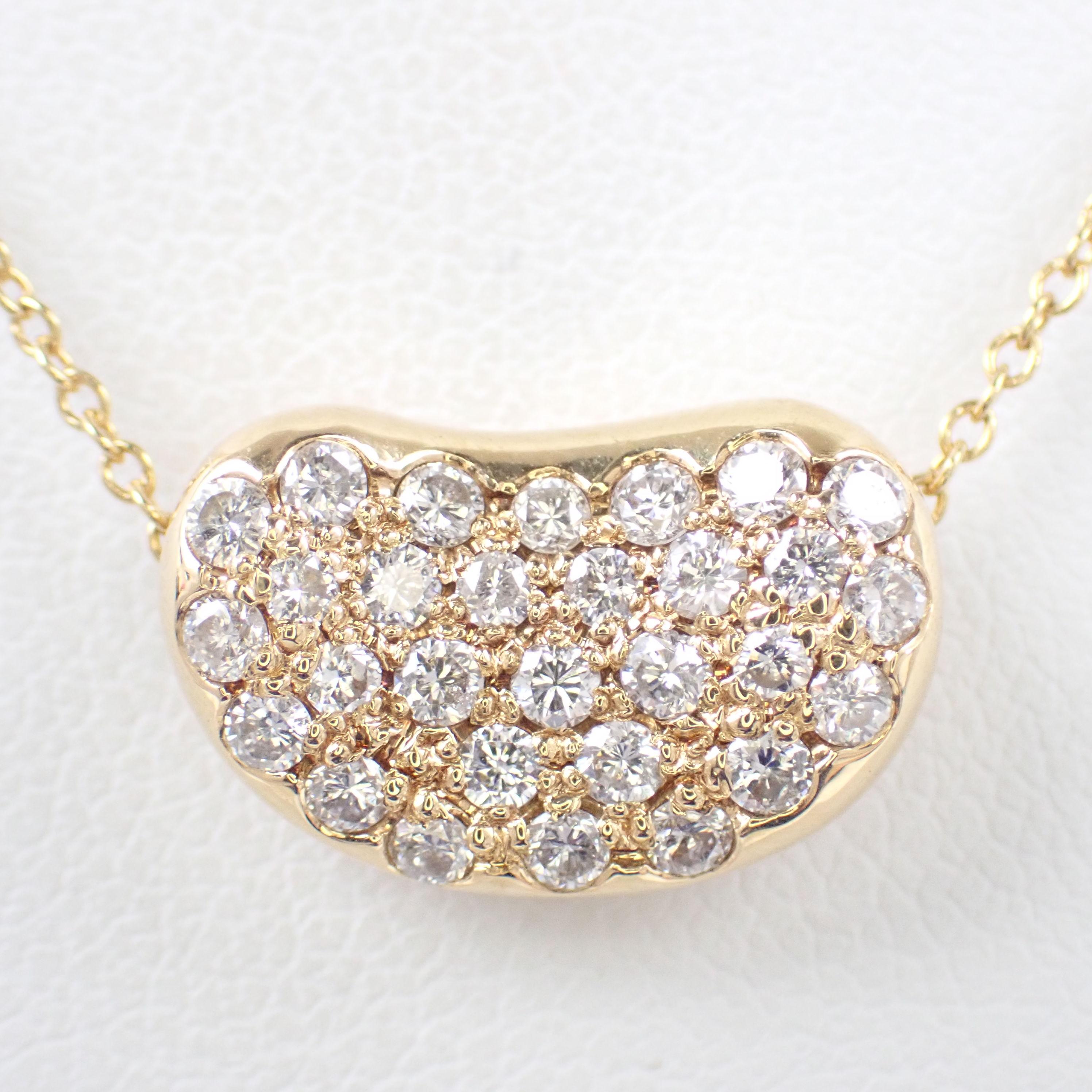 Brand : Cartier 
Description: Bean Diamond Necklace 
Metal Type:  750PG/ Yellow Gold
Total Weight:  6.6g
Width:  16 in (406.4 mm)
Condition: Preowned; small signs of wearing
Box -   Not Included
Papers -  Not Included
