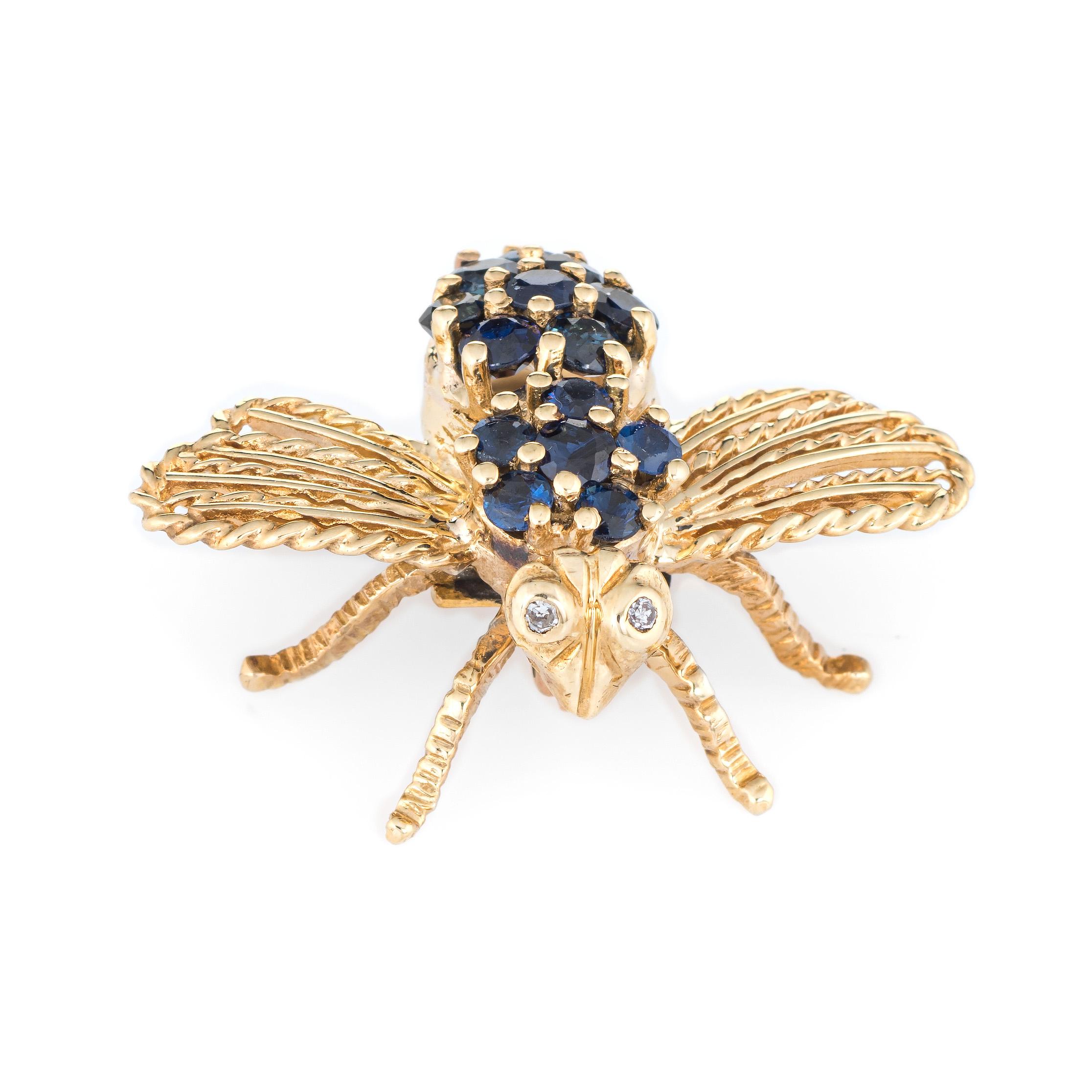 Vintage Cartier bumble bee brooch crafted in 18 karat yellow gold.  

The blue sapphires total an estimated 1.25 carats. Two estimated 0.01 carat diamonds are set into the eyes (estimated at G-H color and VS1 clarity). Note: small chip to one