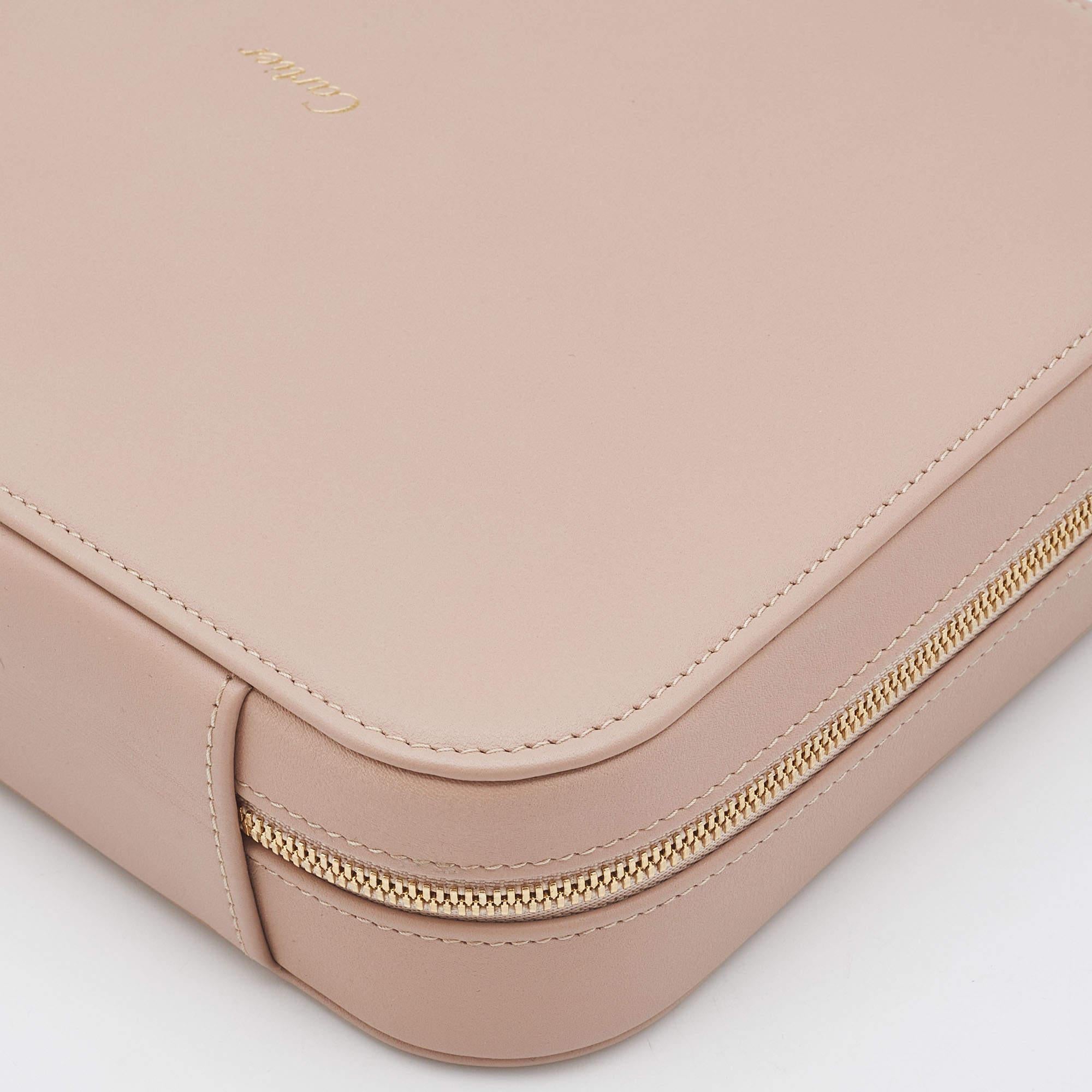 This Cartier jewelry box is perfect for your fashion arsenal, bringing along the house's luxurious design. It is crafted from leather and equipped with a zip-around that reveals a spacious interior for your jewelry. Grab it today!

Includes
Original