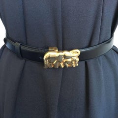 CARTIER Belt in Black Leather and Gilded Elephant Buckle