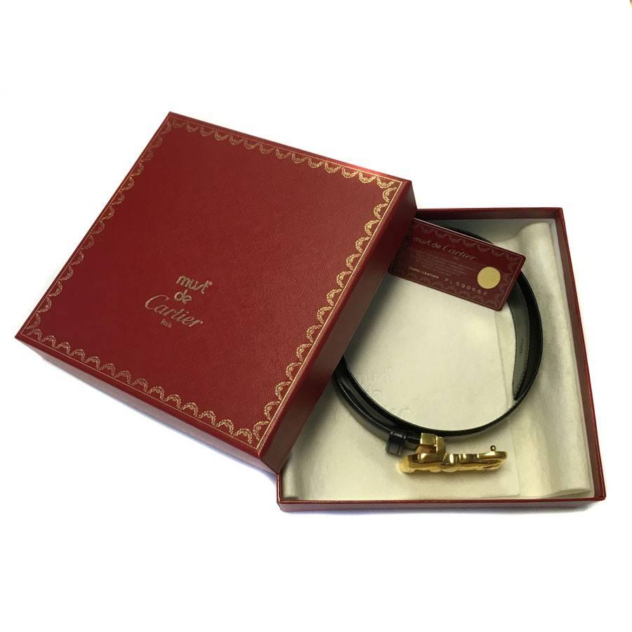 CARTIER Belt in Black Leather and Gilded Elephant Buckle In Good Condition In Paris, FR