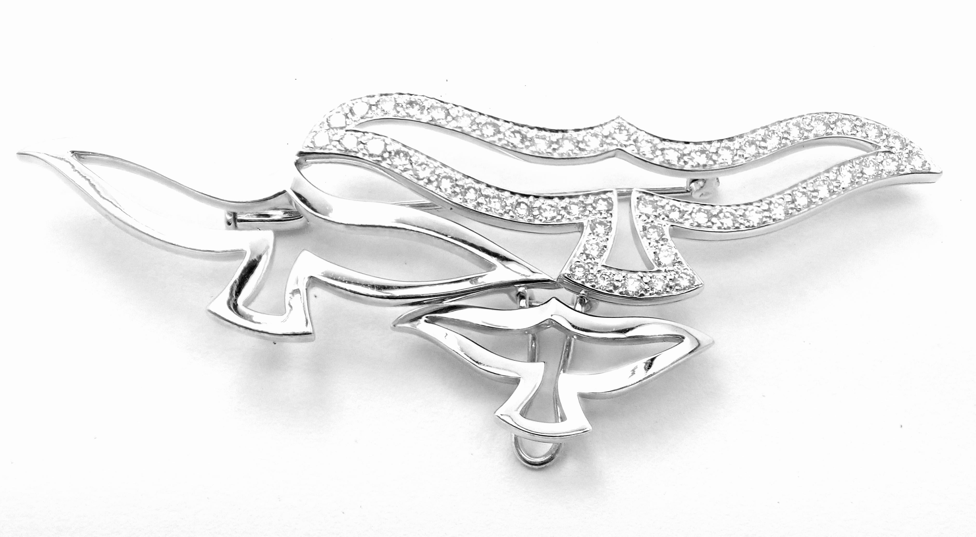 18k White Gold Diamond Bird Pin Brooch Pendant by Cartier. 
With 60 round brilliant cut diamonds VVS1 clarity, E color total weight approximately 2.50ct
Details:
Measurements: 2 3/4