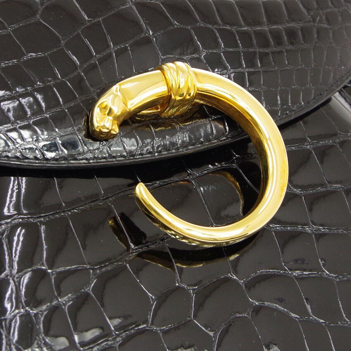 Cartier Black Crocodile Exotic Leather Gold Emblem Evening Kelly Top Handle Satchel Bag

Crocodile
Gold tone hardware
Turnlock closure
Leather lining
Made in France
Handle drop 4