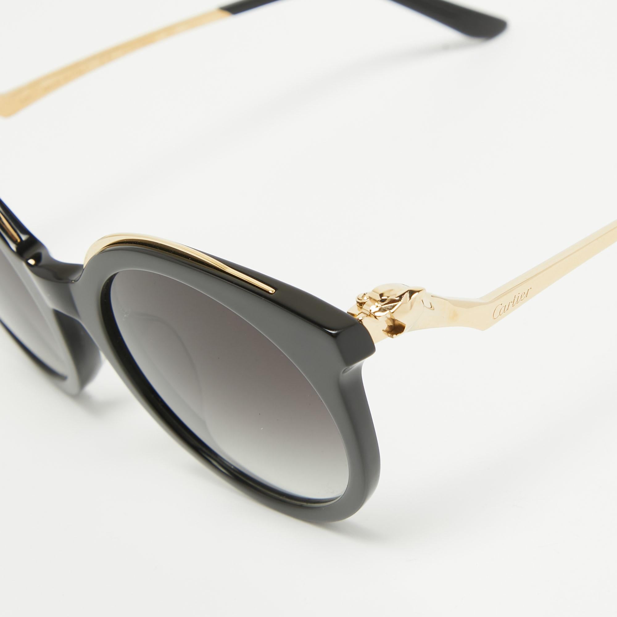 The Cartier sunglasses exude timeless charm and contemporary allure. Crafted with meticulous attention to detail, they feature sleek black frames with gradient lenses, offering both style and functionality. A perfect accessory for those seeking a