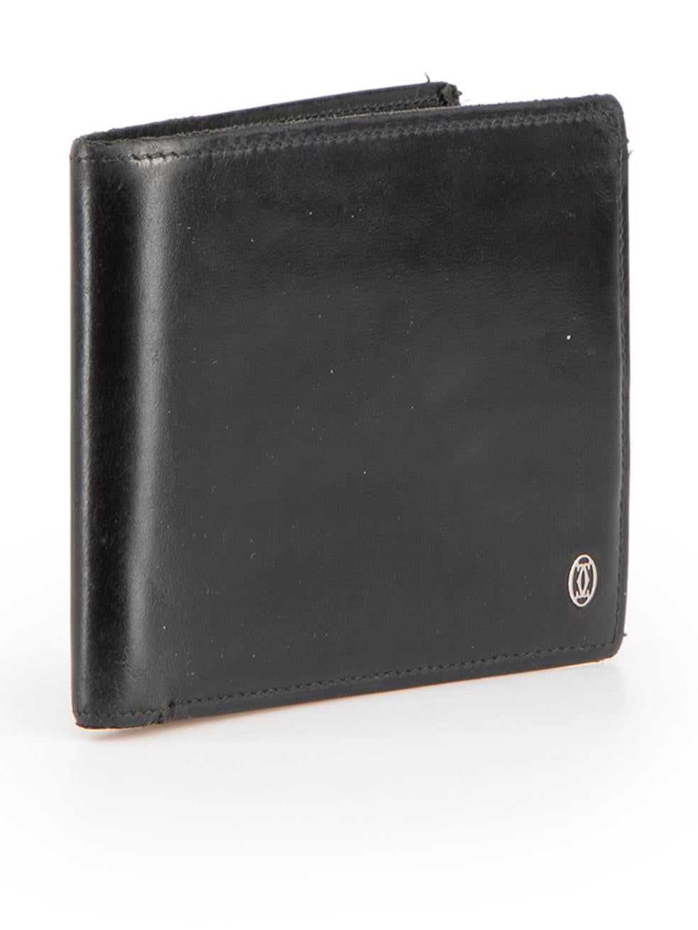 CONDITION is Good. General wear to wallet is evident. Moderate signs of wear to the corners, edges and rear with abrasions to the leather on this used Cartier designer resale item.
 
 Details
 Black
 Leather
 Wallet
 2x Notes holder
 Card holders
 
