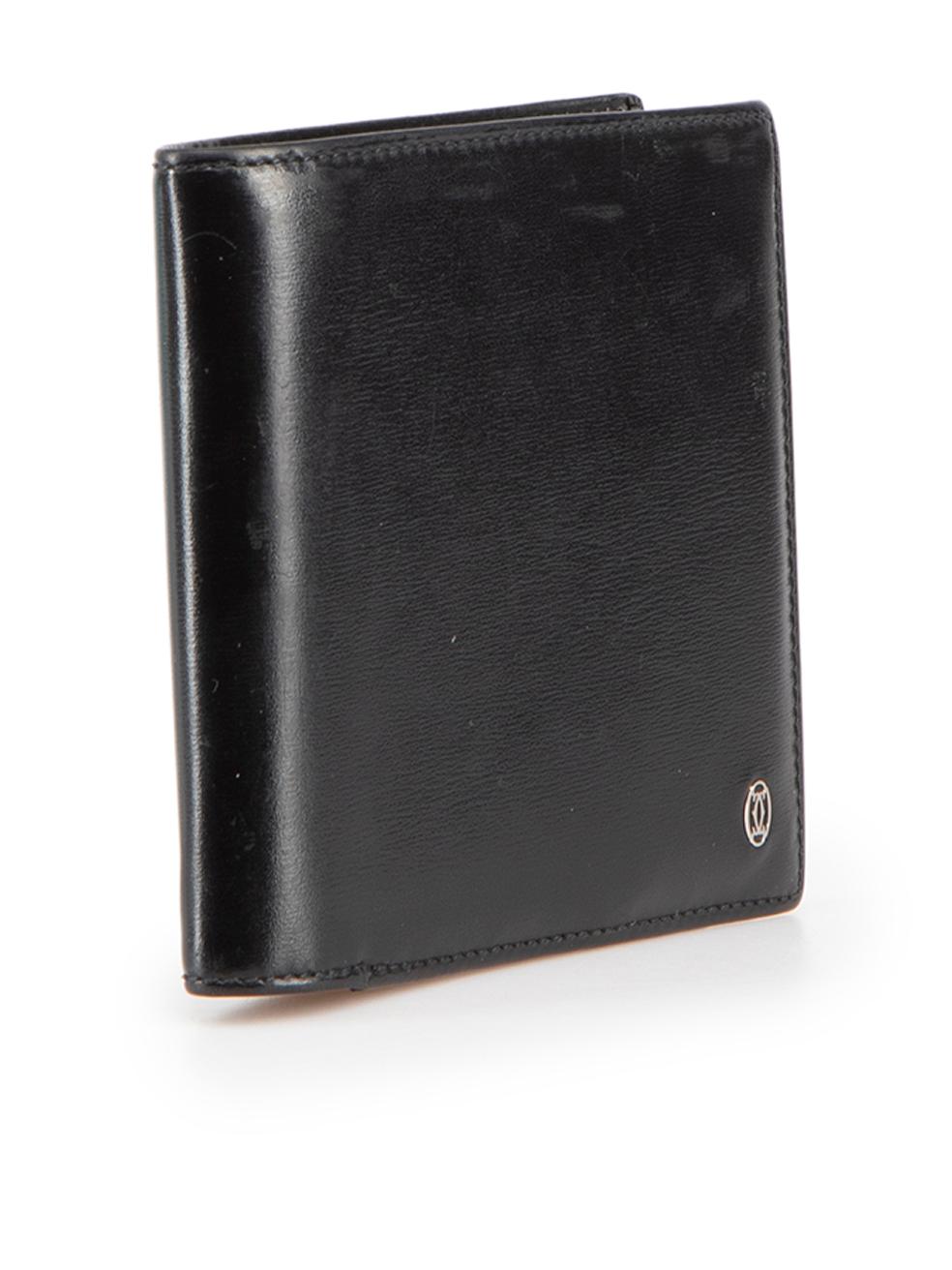 CONDITION is Good. Minor wear to wallet is evident. Light wear to the front and lining with light abrasions to the leather. The edge on the card holder section has come apart on this used Cartier designer resale item.
 
 Details
 Black
 Leather
