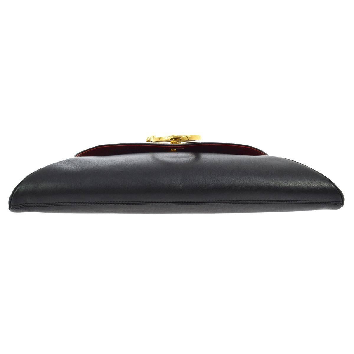 Cartier Schwarze Leder-Clutch mit goldenem Umschlag und Klappe für den Abend Damen im Angebot