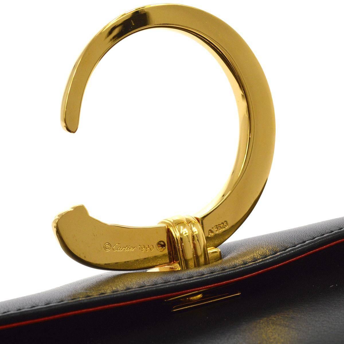 Cartier Schwarze Leder-Clutch mit goldenem Umschlag und Klappe für den Abend im Angebot 2
