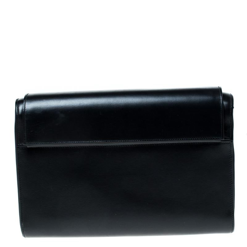 It is so easy to fall in love with this clutch from Cartier. Black in shade and stunning in appeal, this creation will be a fantastic addition to your closet. Meticulously crafted from leather and enhanced with gold-tone hardware, this clutch comes