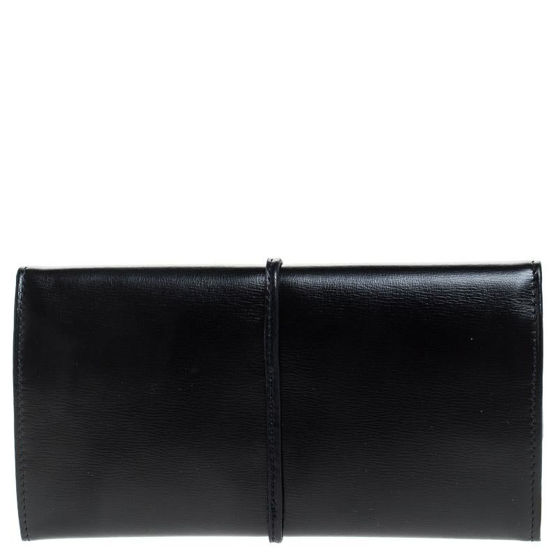 It is so easy to fall in love with this wallet from Cartier. Black in shade and stunning in appeal, this creation will be a fantastic addition to your closet. Meticulously crafted from leather and enhanced with gold-tone hardware, this wallet comes