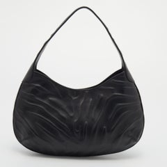 Sac en cuir noir de Cartier, petite panthère de Cartier