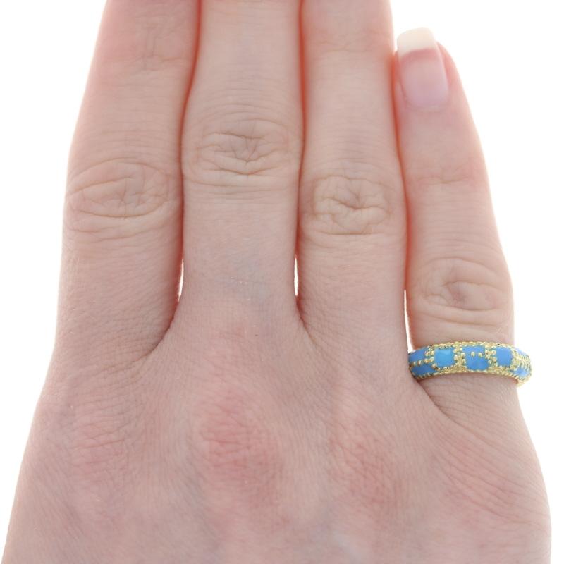 Size: 4 

Brand: Cartier

Metal Content: 18k Yellow Gold 

Material Information: 
Enamel
Color: Blue 

Style: Eternity Band 
Features: Milgrain Detailing

Face Height (north to south): 7/32