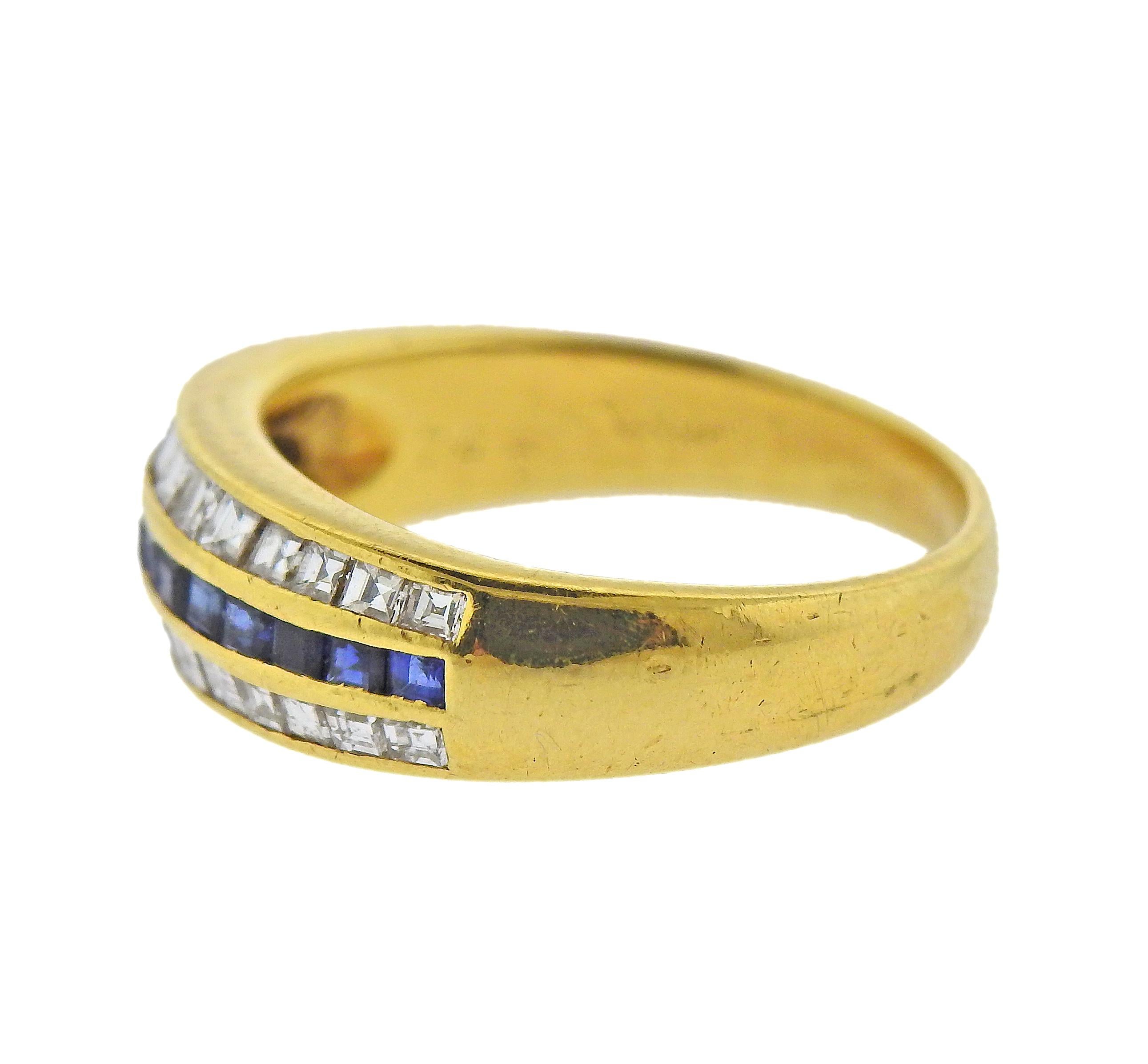 Delicate 18k yellow gold Cartier ring, with blue sapphires and approx. 0.60ctw in diamonds. Ring size - 5.5, ring top is 6mm wide. Marked: Cartier, 18k, 09-08 (scratched number), 746. Weight - 4.4 grams. 