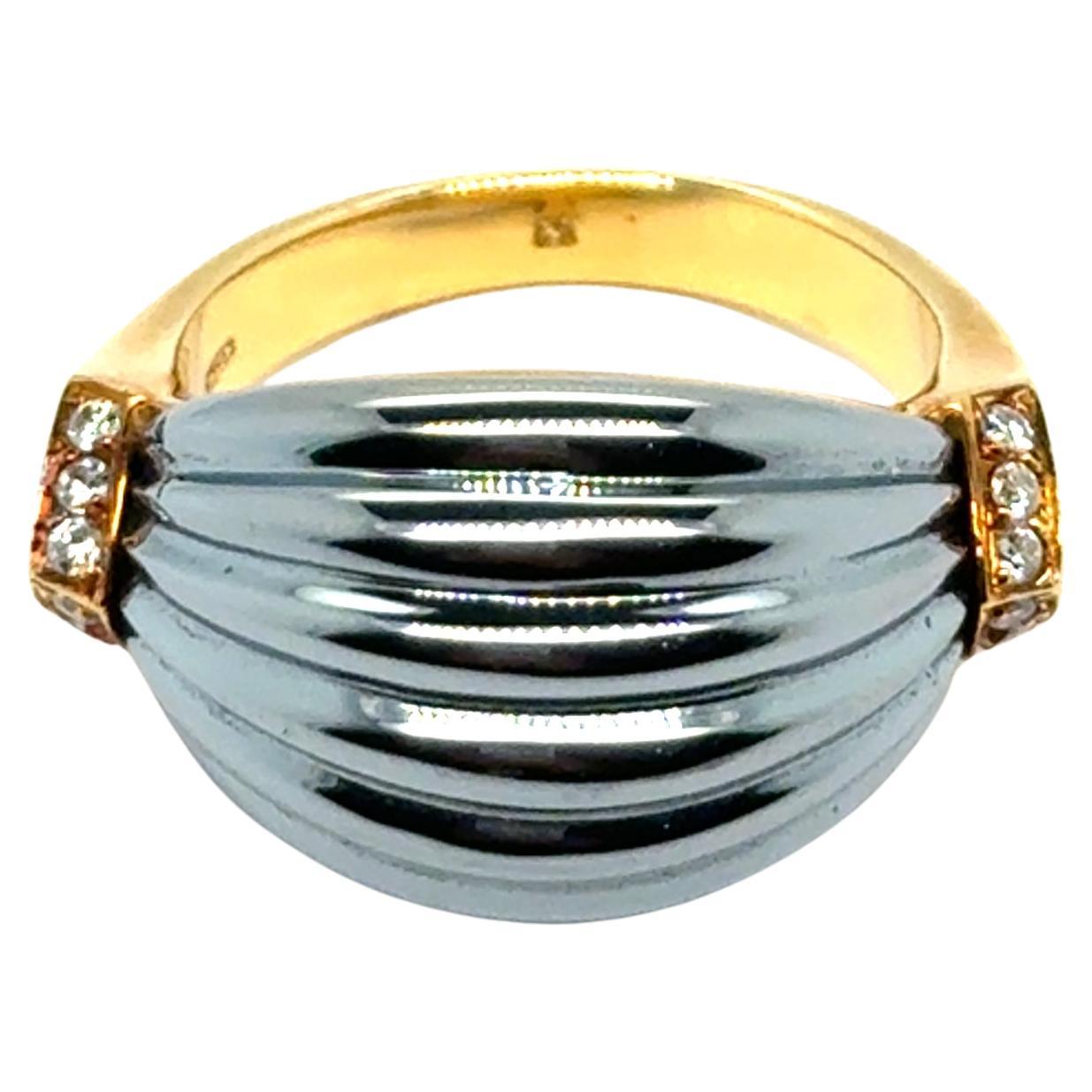 Cartier Bombe Ring with Hematite and Diamonds in 18 Karat Yellow Gold