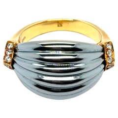 Cartier Bombe Ring with Hematite and Diamonds in 18 Karat Yellow Gold