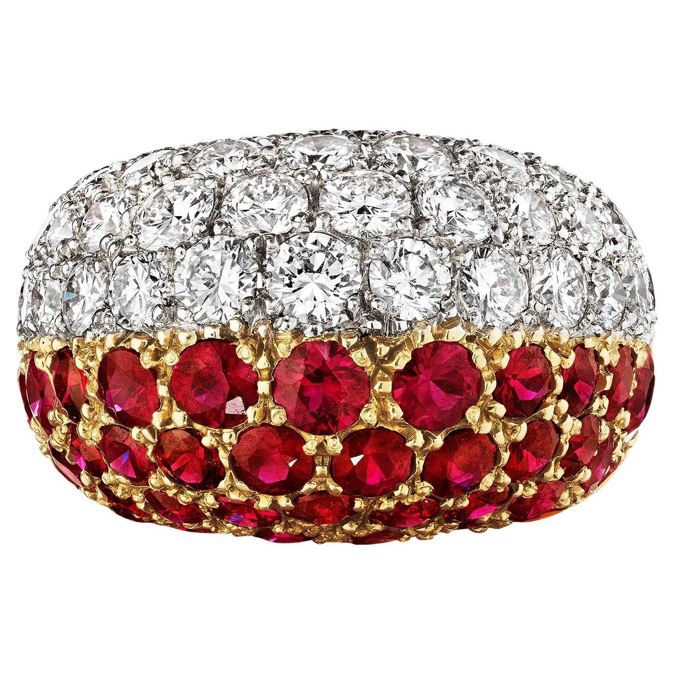 Bombé Ruby and Diamond Ring by Cartier, Paris, circa 1970
 
A ring of bombé form composed of pavé-set diamonds and rubies; mounted in platinum and yellow gold, with French assay marks
• Diamonds, total weighing approximately 4.5 carats 
• Rubies,