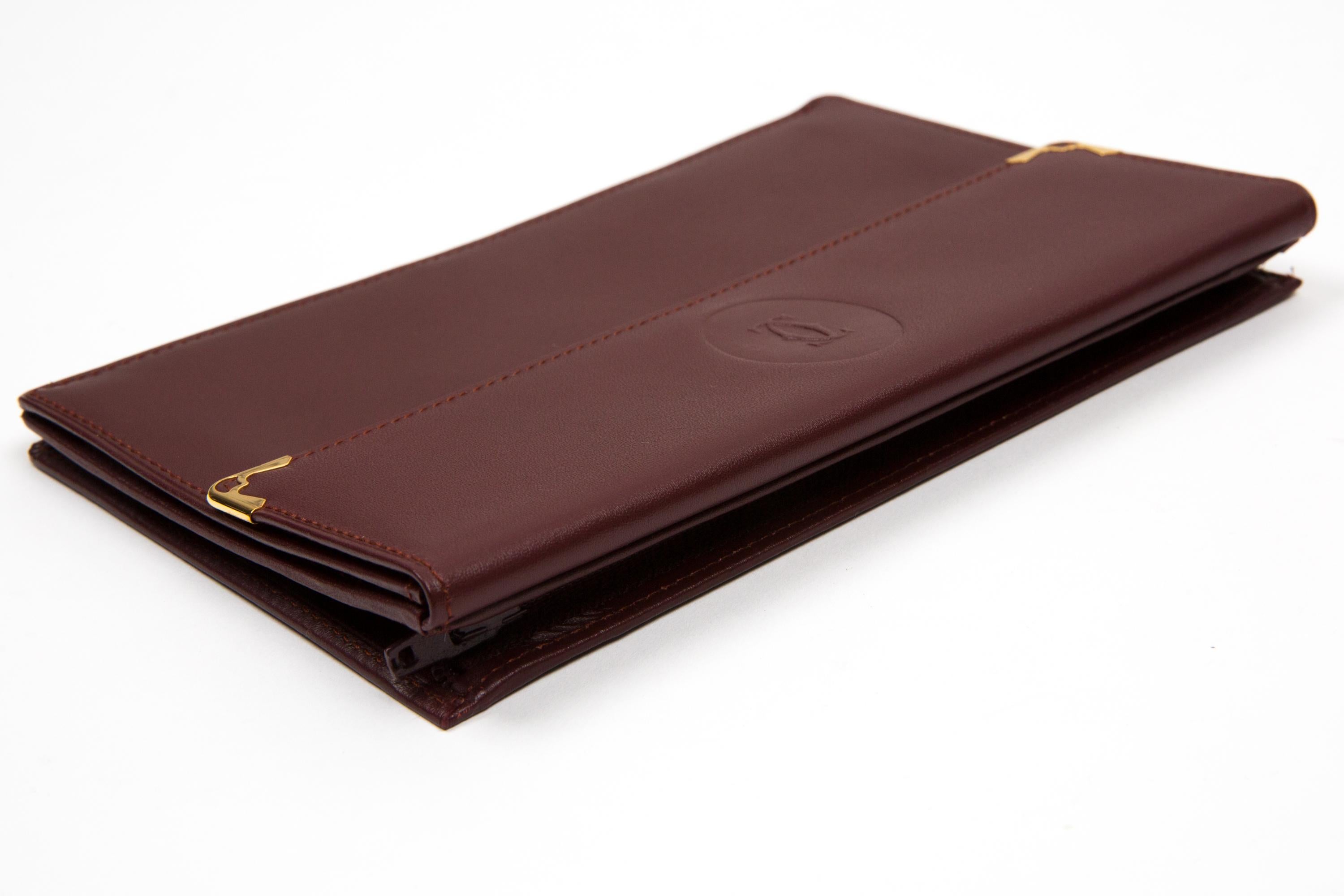 Pochette in pelle Cartier Bordeaux In condizioni buone in vendita a Paris, FR